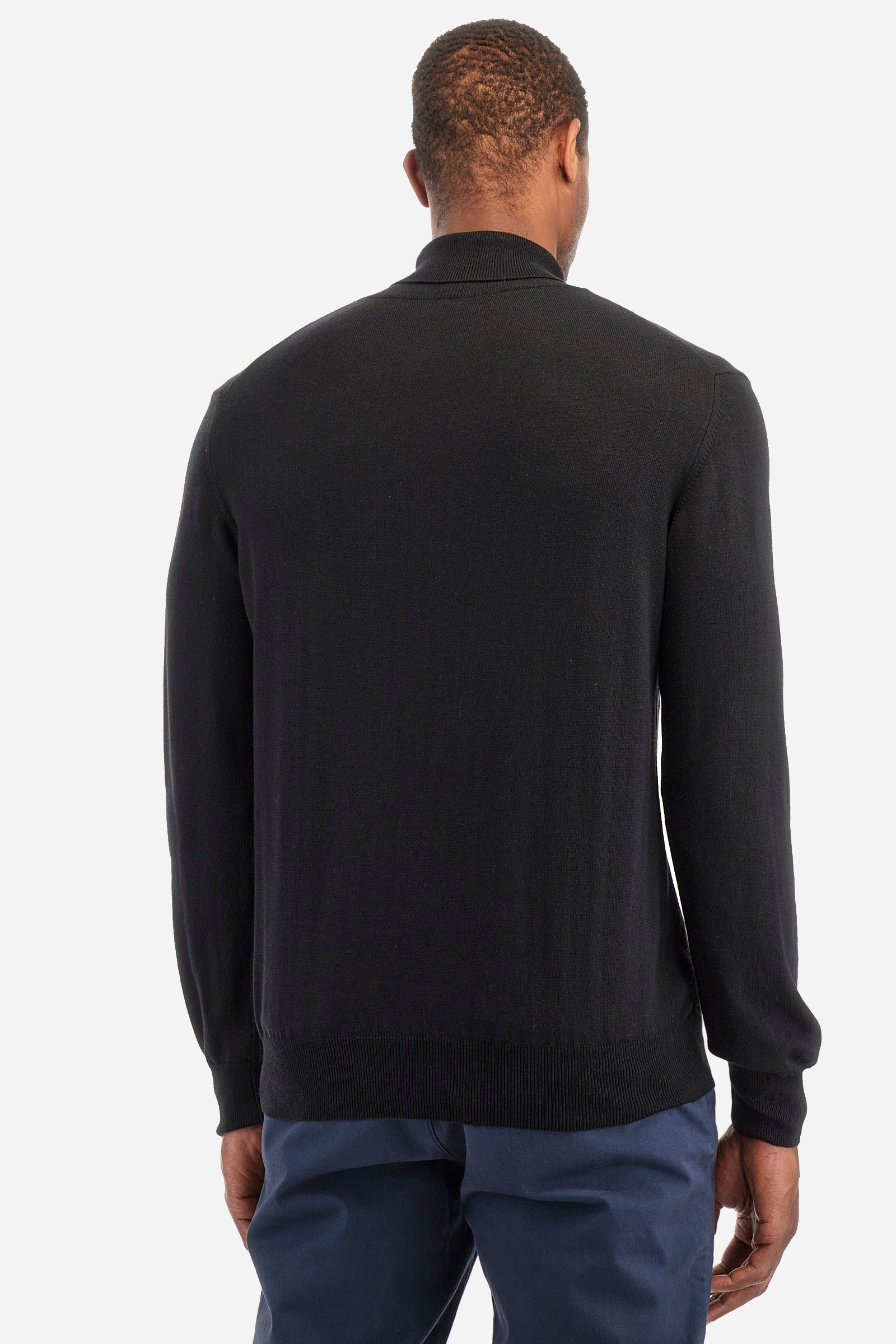 Men's plain high neck pullover with long sleeves. Made from a blend of cotton and wool. Ribbed collar, cuffs and hem. The brand logo is embroidered on the front. Regular fit. The model is wearing a size L. - Black