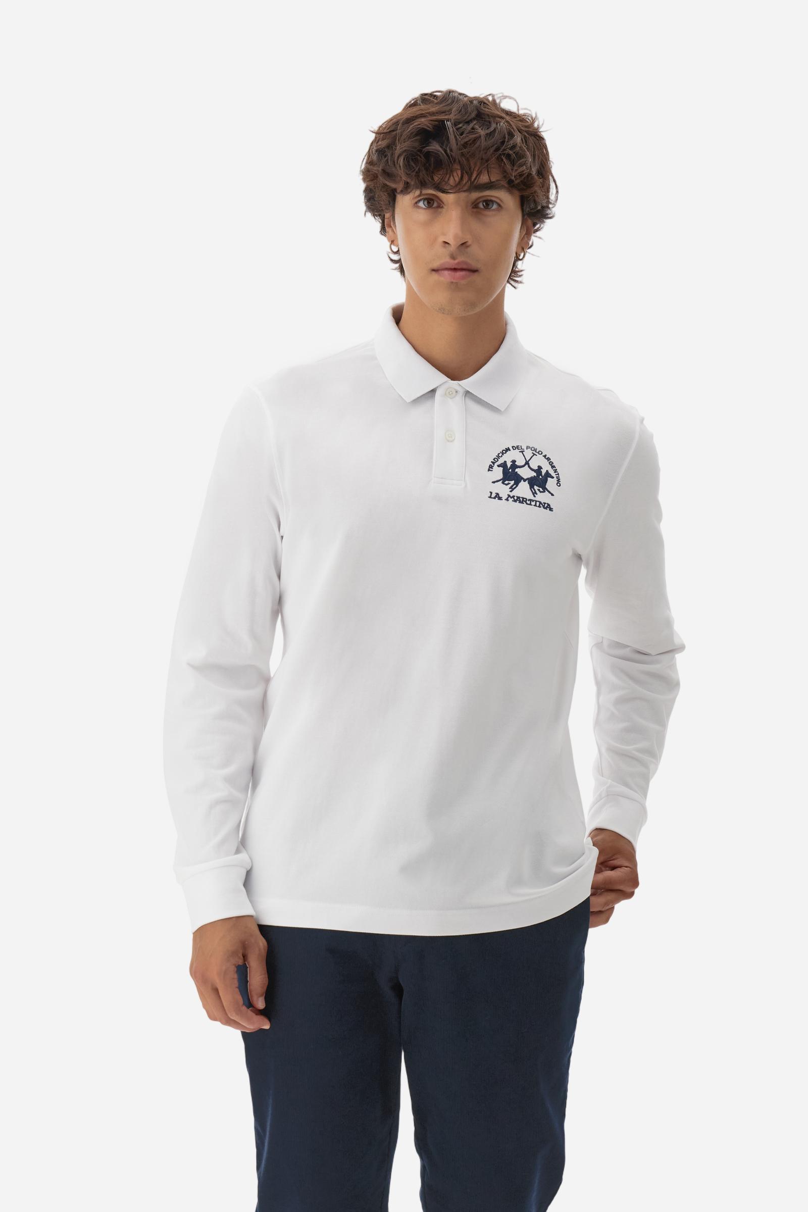 Men's long-sleeved solid colour polo shirt. Made of high-quality stretch Piqué. The collar and cuffs are in solid colour ribbing. The undercollar features a print of the iconic La Martina lettering in a contrasting colour. Featuring a logo embroidered on the chest in a contrasting colour. On the back at the bottom, the guarantee label typical of the brand's iconic models is applied. Regular fit. The model is wearing a size L. - Optic White