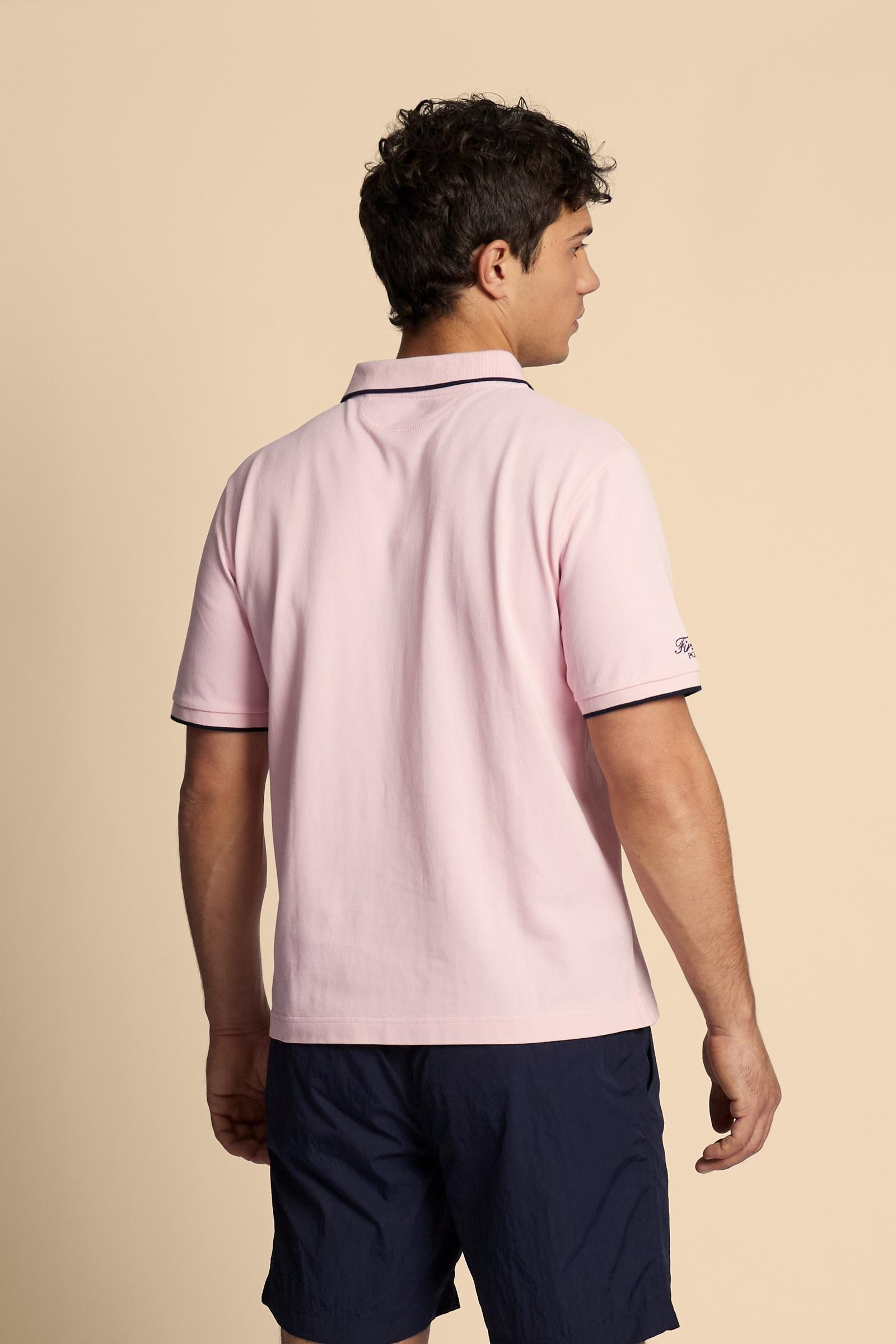 Piqué cotton polo with classic collar and contrast details. Graphic embroidery on chest and sleeves, including the “Academy Polo Club” crest. Modern clean fit. - FairTale