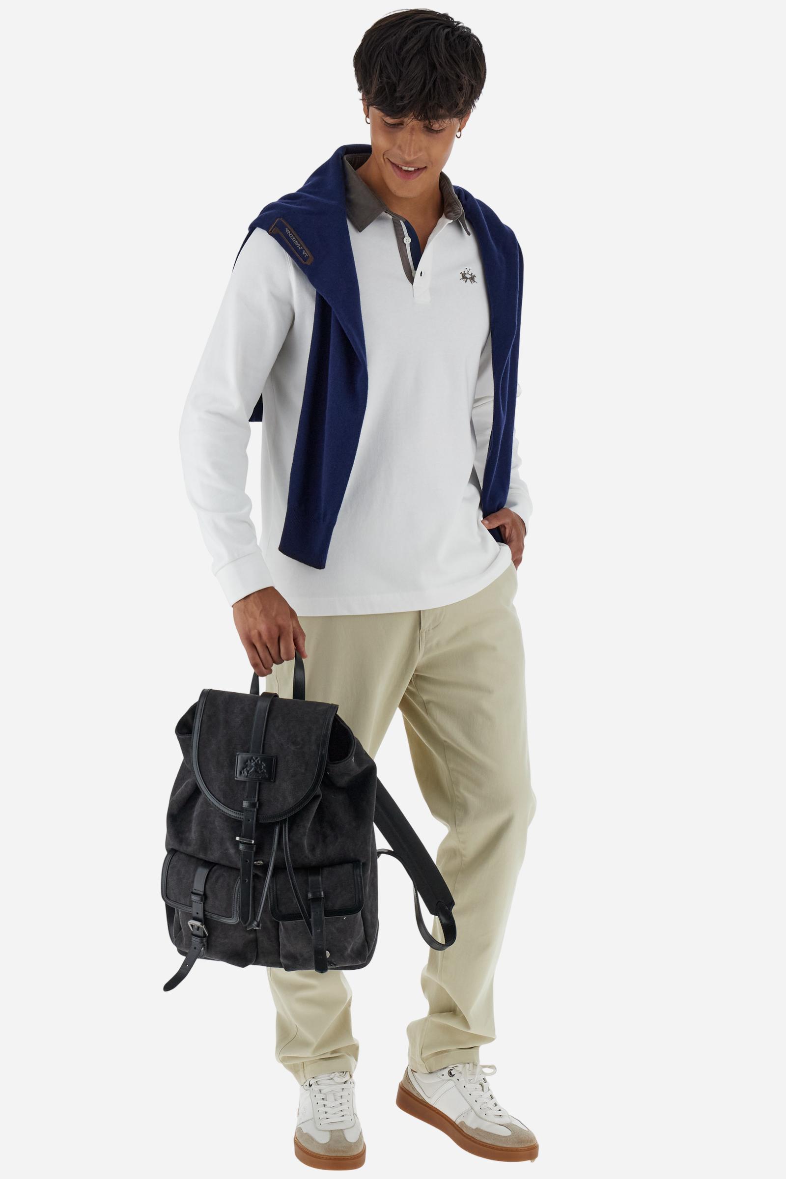 Classic men’s long-sleeve polo in soft-touch 100% cotton jersey. Contrast gabardine collar, three-button placket with multicolor striped tape. Iconic La Martina lettering printed in contrast under the collar. Small contrast logo embroidered on the chest. Regular fit for a balanced silhouette. Model wears size L. - Off White