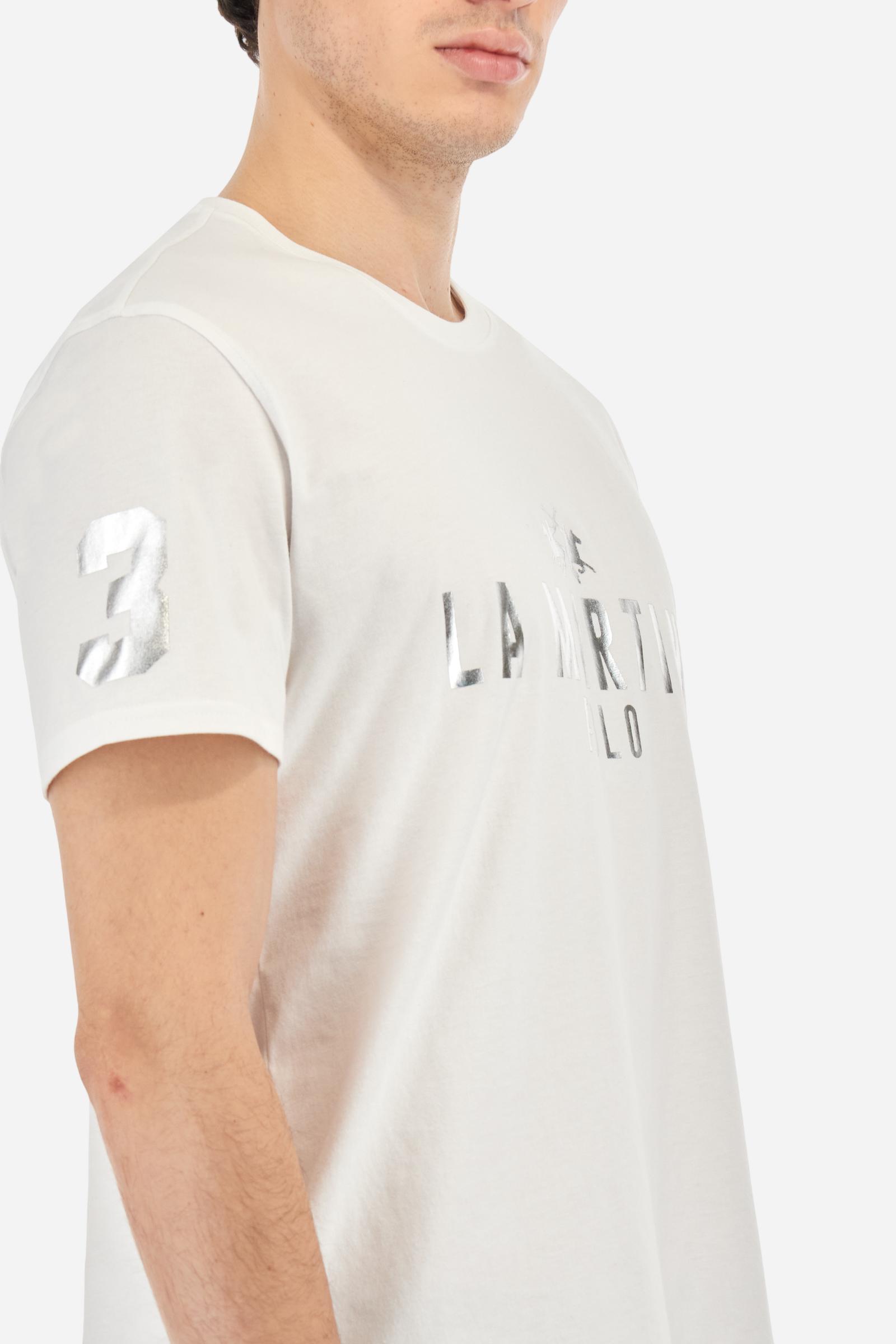 Men's single-colour crew-neck T-shirt with short sleeves, made of 100% cotton. The front features a printed logo and the lettering La Martina Polo. The number 3 is printed on one of the sleeves. Regular fit. The model is wearing a size L. - Optic White
