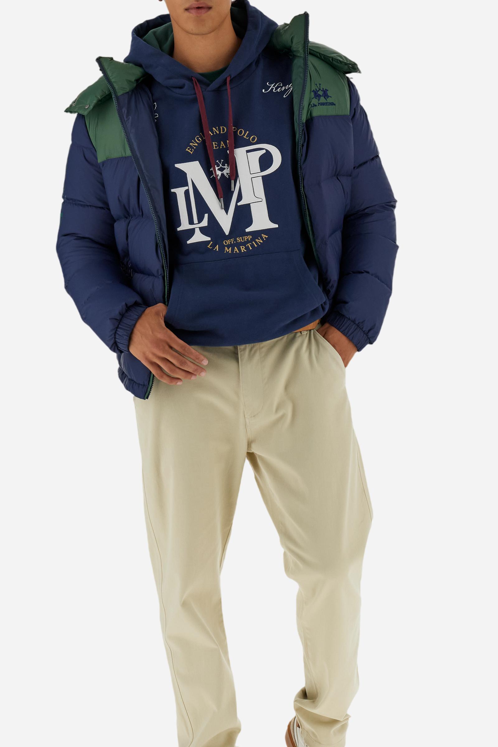 Men's long-sleeved hoodie in solid cotton French terry. Features a large kangaroo pocket, hem and cuffs in tone-on-tone rib. Adjustable hood with contrast lining. Chest and sleeves decorated with modern LM monogram graphics inspired by British polo. Contrasting embroidered logo on the chest. Regular fit for a relaxed and comfortable silhouette. Model wears size L. - Navy