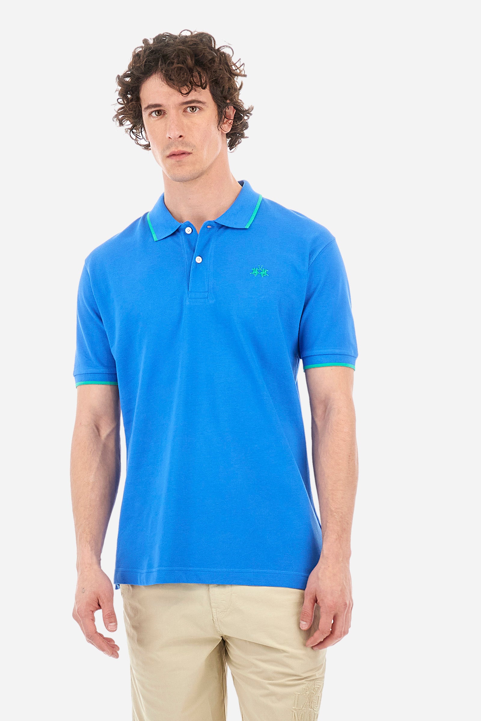 Men’s polo with short sleeves in stretch pique cotton. A classic La Martina, with a simple and linear style. The regular fit fits easily to any type of silhouette. A small La Martina logo is embroidered on the chest, in contrasting shades like the sleeve edge. The model is 187 cm tall and wears a size L. - Campanula