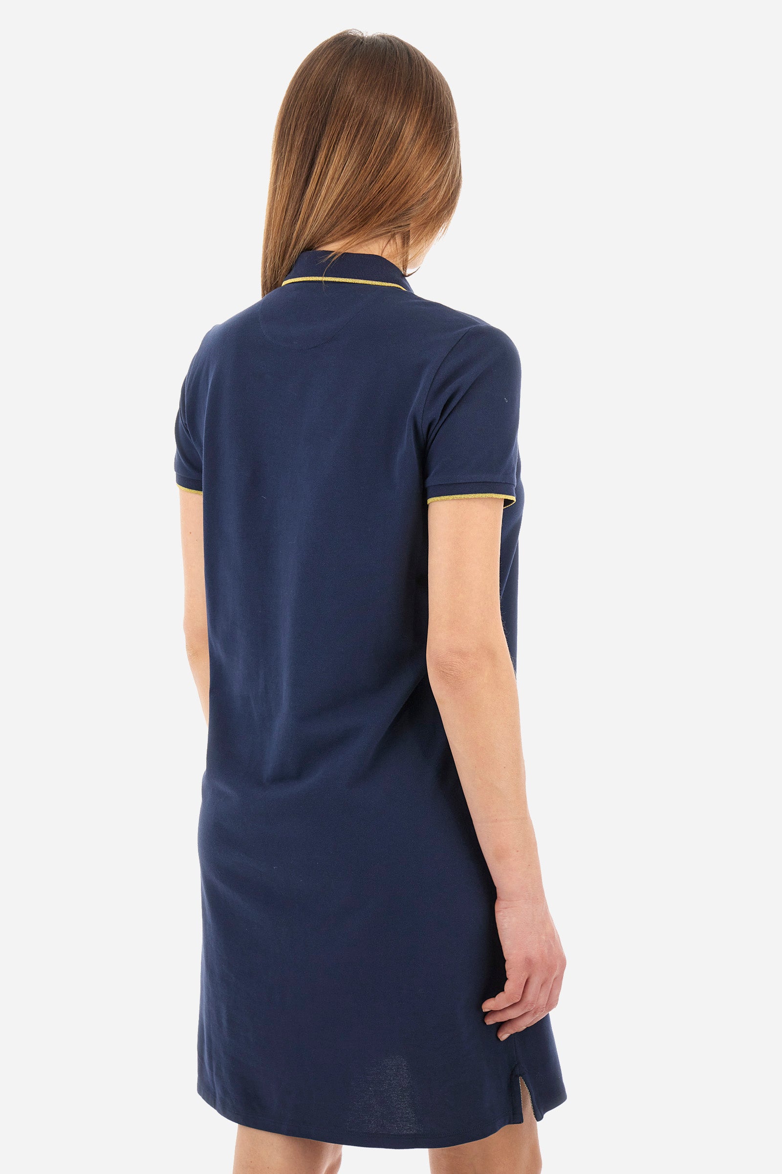 Single-colour short-sleeved dress made of elasticated cotton. Soft, straight cut silhouette, above-the-knee length. With a profiled and ribbed collar and armholes. Collar with contrasting rhinestone writing. With button fastening. The "La Martina" lettering can be found under the collar. A rhinestone logo is applied on one of the sleeves. The fit is regular. The model wears a size 2. - Navy