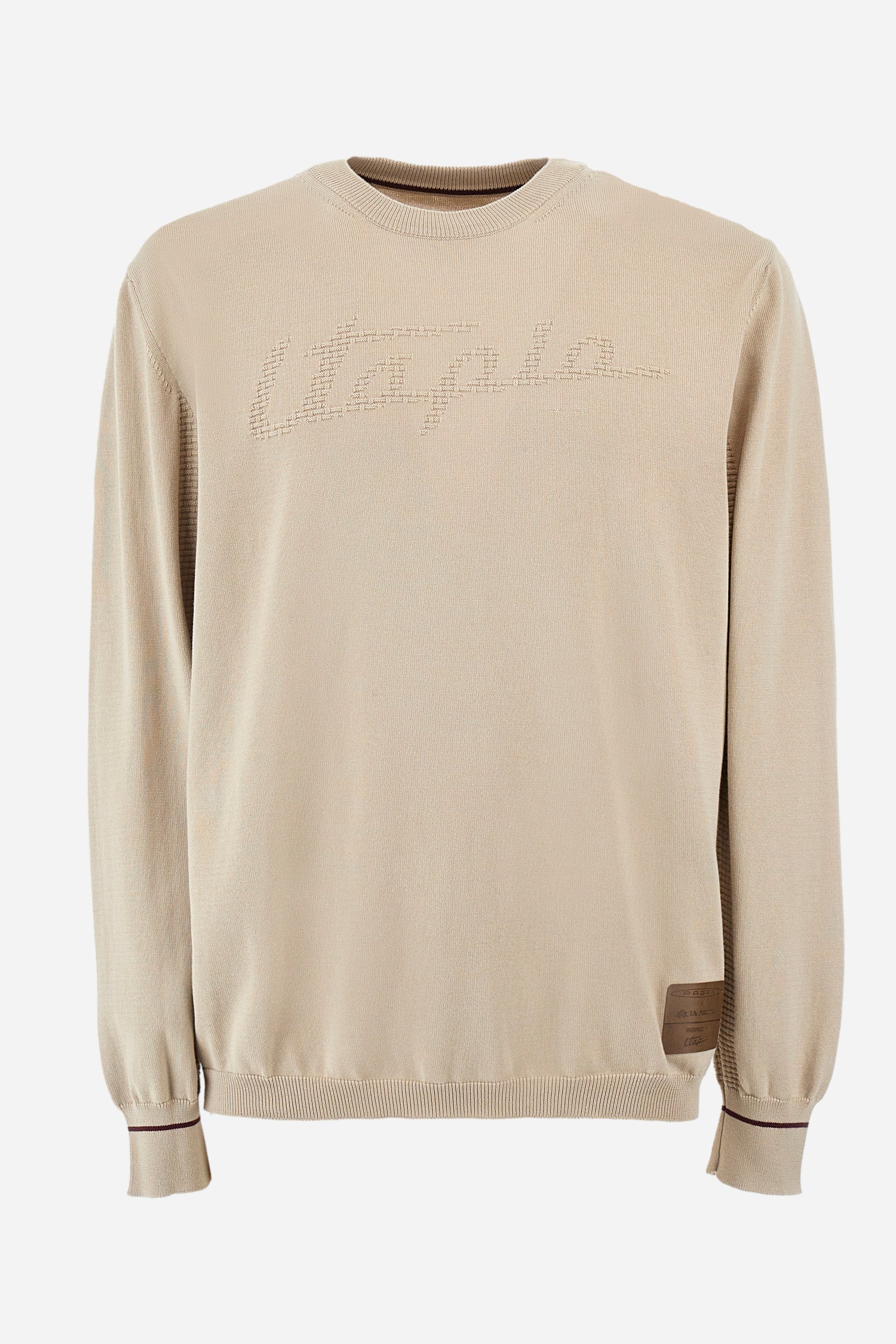 Men's long-sleeved crew-neck jumper in a single colour in collaboration with Pagani. Made from 100% cotton. Some parts of the garment have a woven basket stitch texture. Ribbed cuffs, neck and waist. The front features the line's characteristic lettering. The logo and "La Martina" and "Pagani" lettering are present on the patch representing the collaboration applied on both the front and back. The fit is regular. The model wears a size L. - Rainy Day