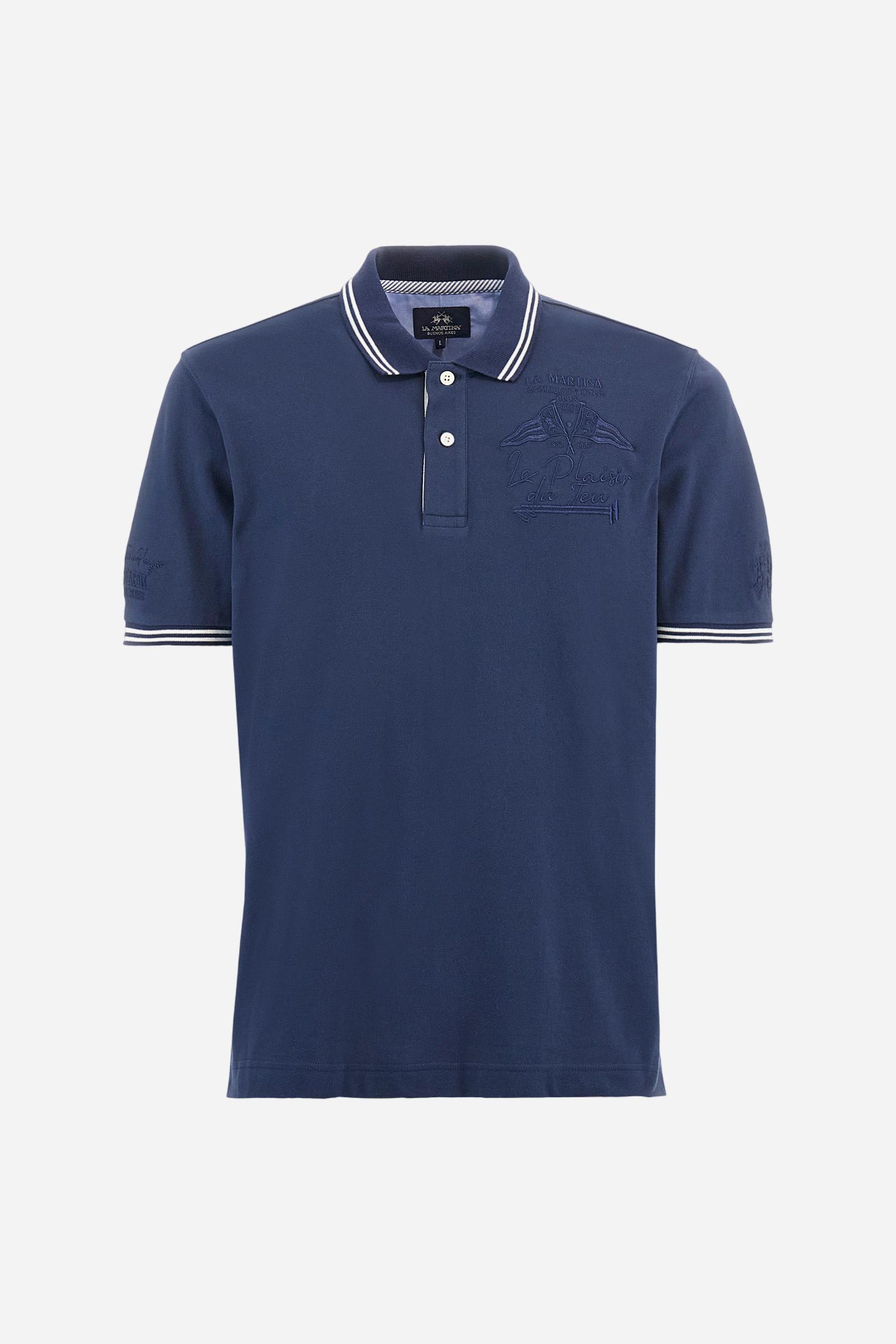 Men's plain short-sleeved polo shirt made from stretch piqué. Two-button fastening. The collar and cuffs are made from two-tone striped ribbed fabric. The inside of the collar and placket feature contrasting fabrics and colours. There is a two-tone striped band around the inside of the collar. The right sleeve and chest are embroidered in tone-on-tone thread. A logo is embroidered on the left sleeve, also using tone-on-tone thread. Regular fit. The model is wearing a size L. - Navy