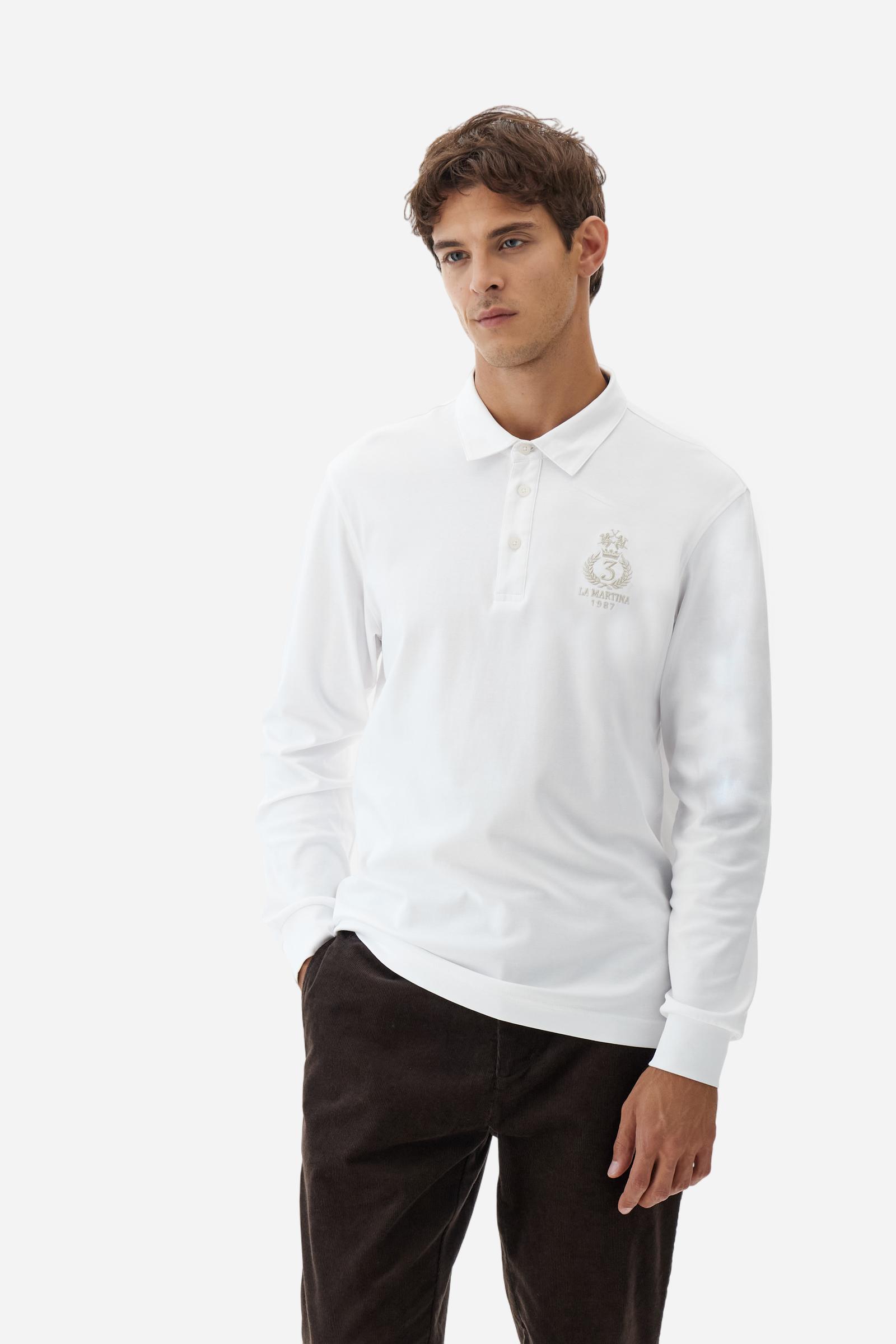 Classic men’s long-sleeve polo in silky 100% cotton jersey, smooth and lightweight to the touch. Three-button placket with contrast details inside the collar. Tone-on-tone ribbed cuffs. Tonal chest print inspired by Polo Club, combined with embroidered undercollar. Discreet logo integrated into the chest graphic. Regular fit. Model wears size L. - Optic White