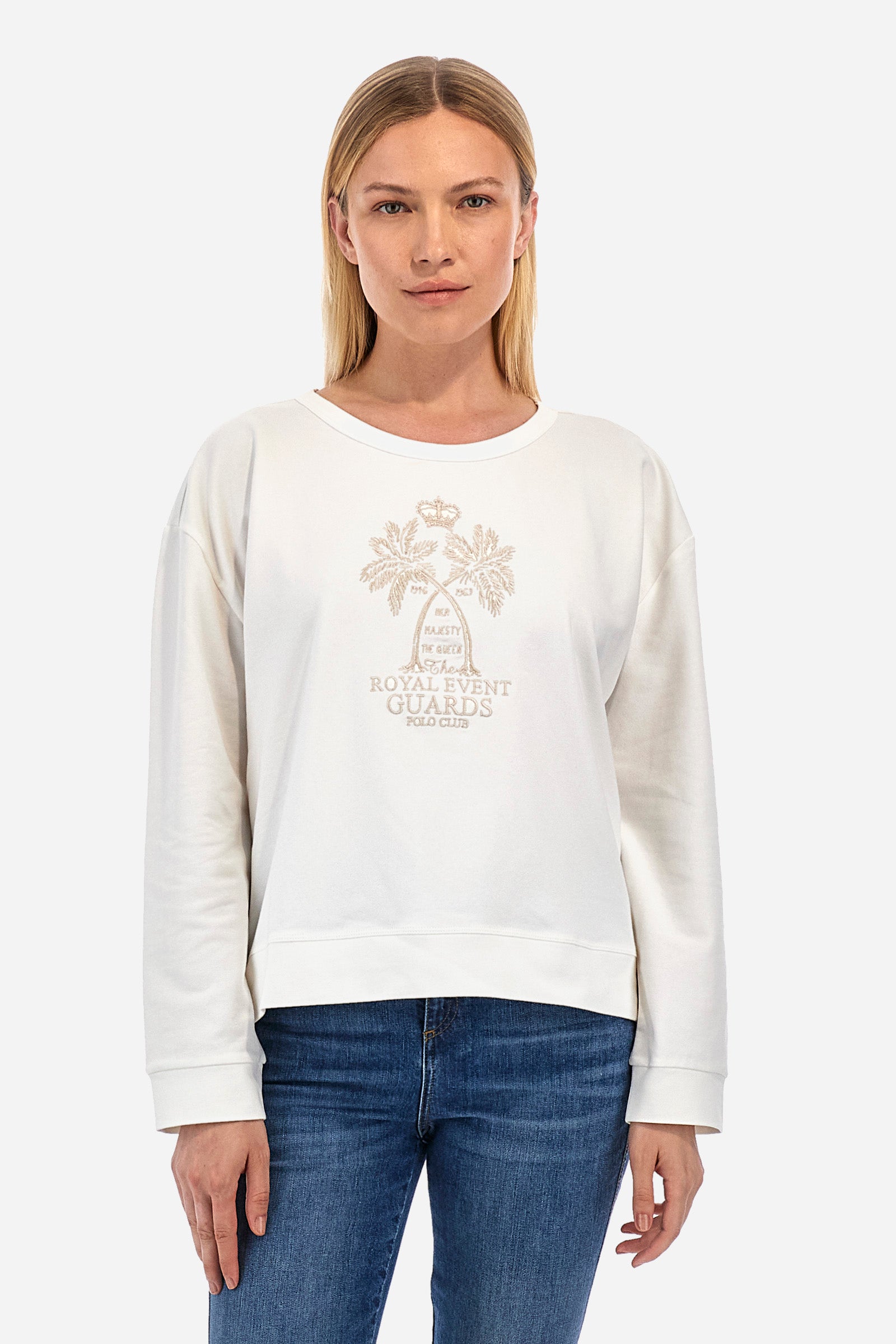 Women's long-sleeved sweatshirt with a crew neck in a single colour, in elasticated cotton. The front features embroidered palm trees and lettering. On the back there are decorative buttons. The logo is embroidered on one of the sleeves together with the symbol of a crown. The fit is regular. The model wears a size 2. - Off White