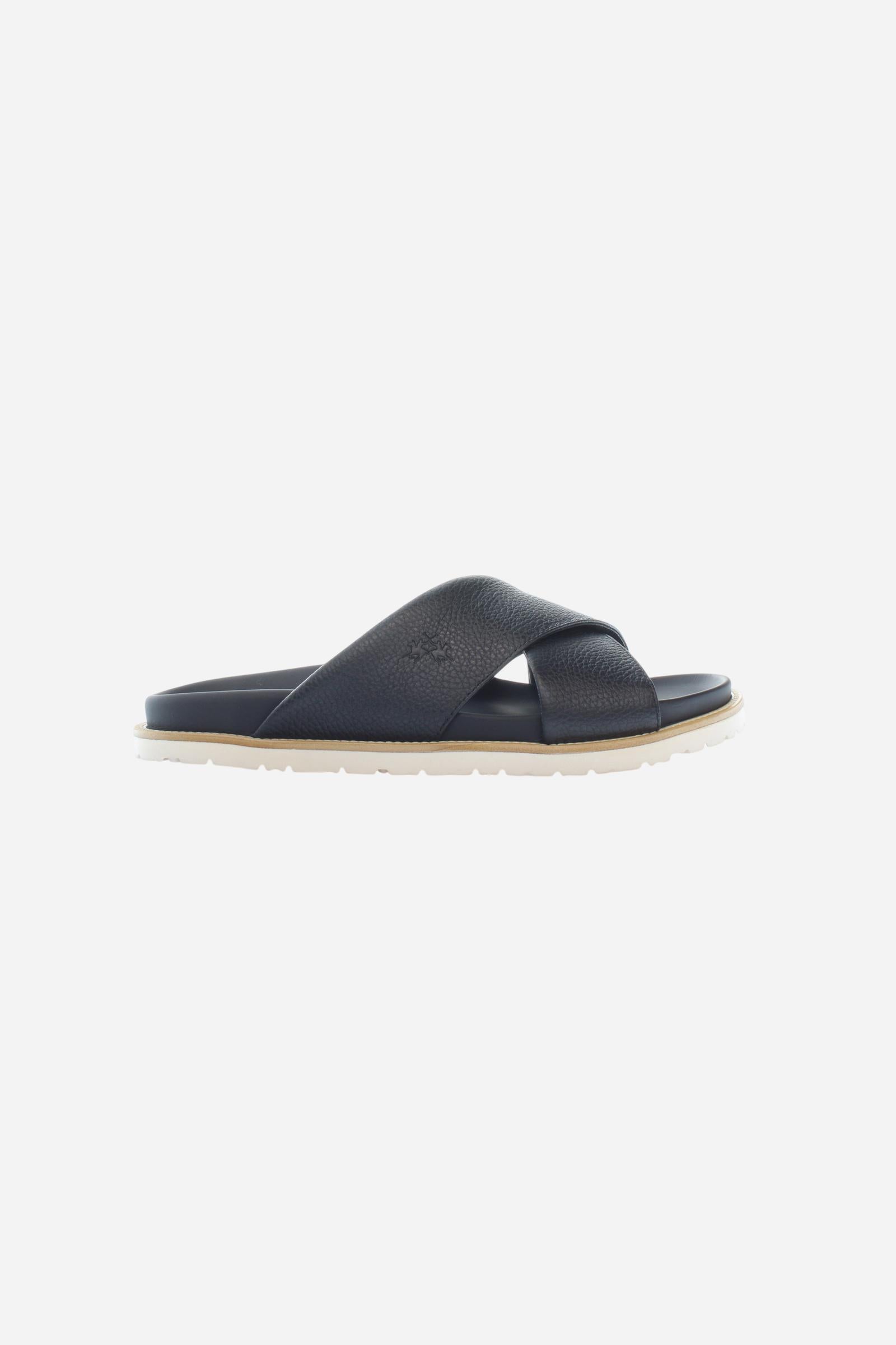 Men’s slides, lightweight and comfortable, made from super soft nappa leather with inner lining on the straps for enhanced comfort. The leather welt, stitched directly to the upper, adds a handcrafted detail that elevates the design. The model features a printed logo on the covered footbed and horse motif on the side strap. The ultra-light EVA sole ensures practicality, lightness, and freedom of movement for everyday wear combining comfort and style. - Black