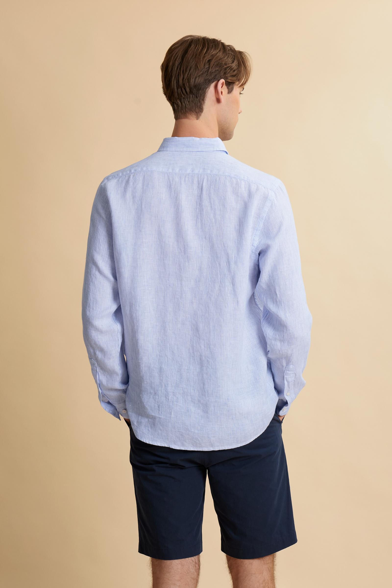 Shirt in 100% linen with vertical micro stripes and natural slub texture. Regular fit that follows the body. Embroidered logo on the chest and signature details on the placket. - OptWhitePrincessBlue