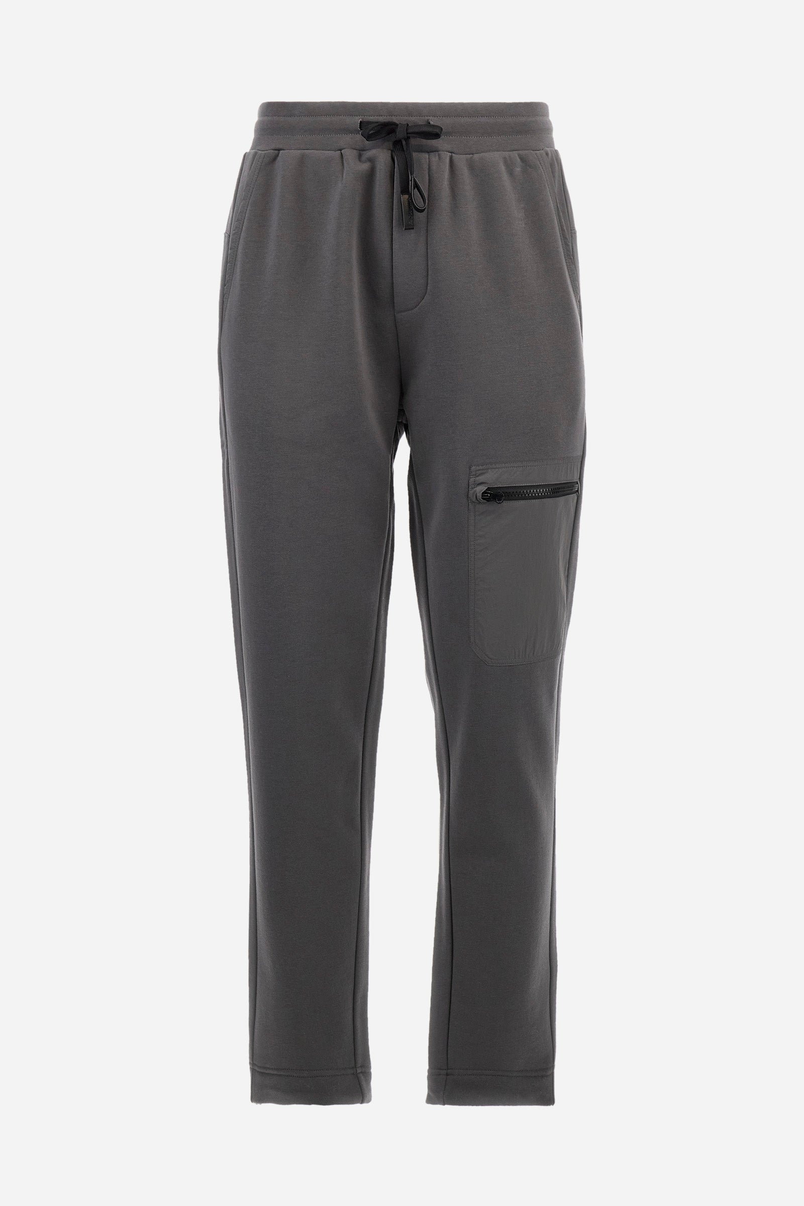 Men's plain jogging bottoms, made from a cotton blend. Drawstring waist and cuffs. Double front pocket. There is an additional zipped pocket on the front. The logo appears on an appliquéd plaque the back. Regular fit. The model is wearing a size L. - Rabbit