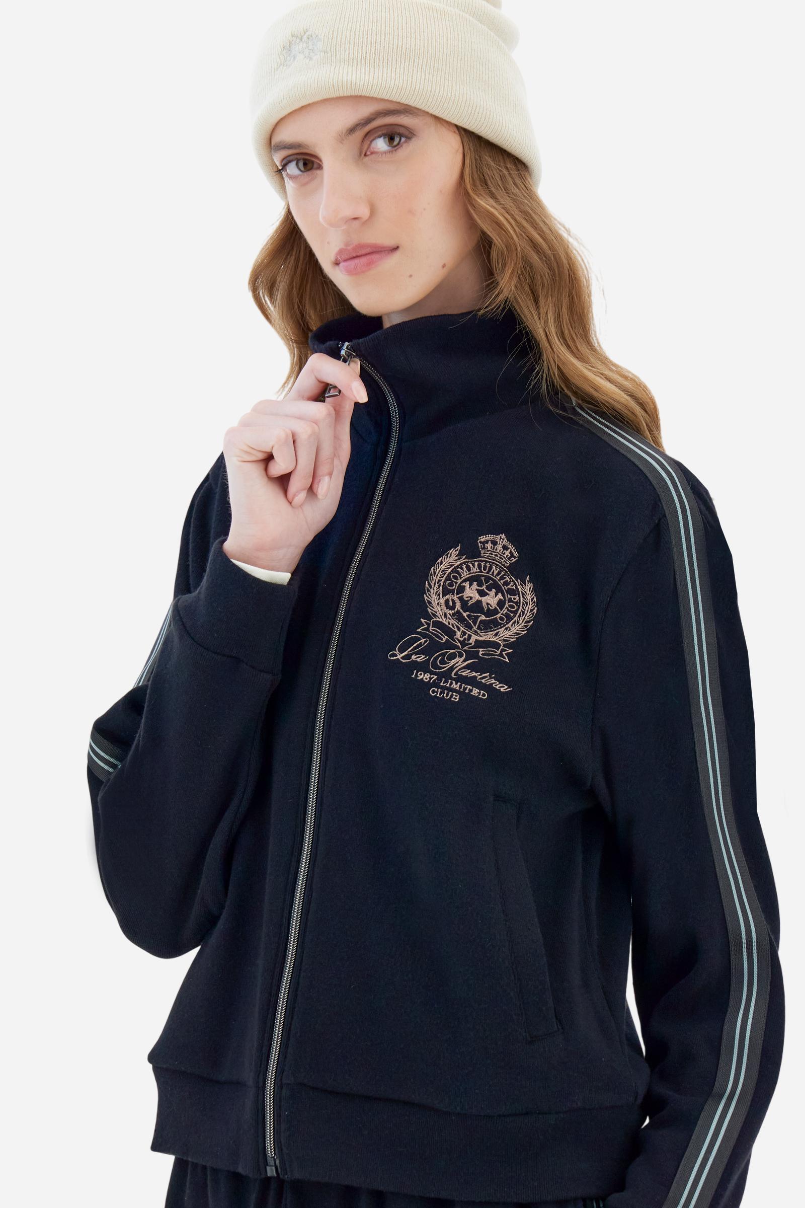 Women’s full-zip sweatshirt with long sleeves in soft interlock viscose blend, offering a luxurious feel on the skin. Straight cut with fluid line and sport-luxury details. Striped bands on the sleeves and heraldic embroidery on the chest add a contemporary touch. The model wears size 2. - Black