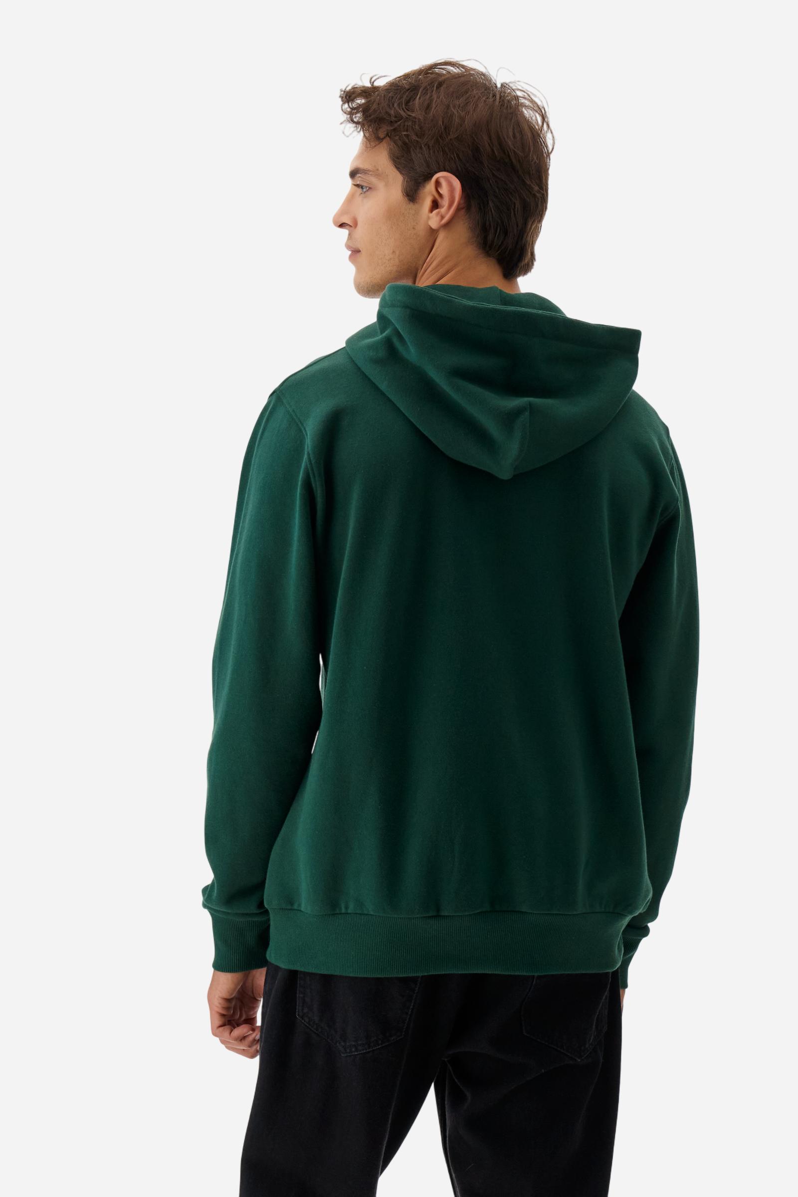 Men's long-sleeved hoodie in solid colour, made from soft 100% cotton fleece with a velvety touch. The model features a customised front zip and an adjustable hood with drawstring. Hem and cuffs in tone-on-tone rib. Iconic brand graphics stand out on the chest, embroidered with numbers and lettering. Regular fit ensuring comfort and freedom of movement. Model wears size L. - Sycamore