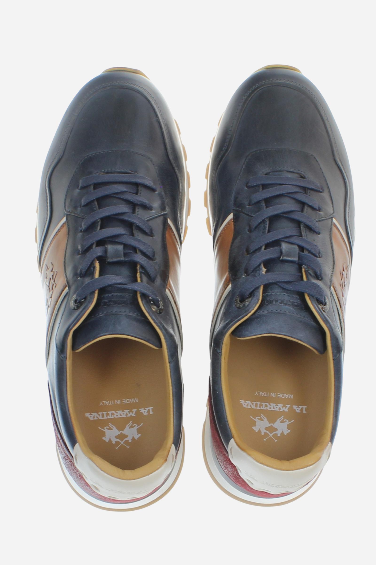 Handcrafted sneakers in calfskin and vegetable-tanned leather, hand-aged. Iconic hot-branded details and a technical sole with leather heel for superior stability. - Salute