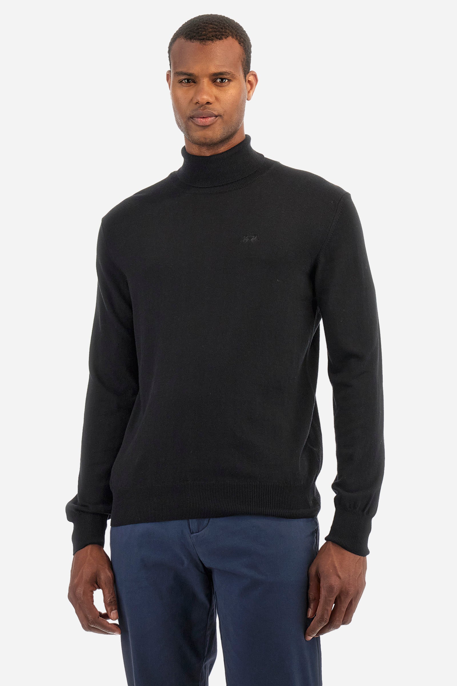 Men's plain high neck pullover with long sleeves. Made from a blend of cotton and wool. Ribbed collar, cuffs and hem. The brand logo is embroidered on the front. Regular fit. The model is wearing a size L. - Black