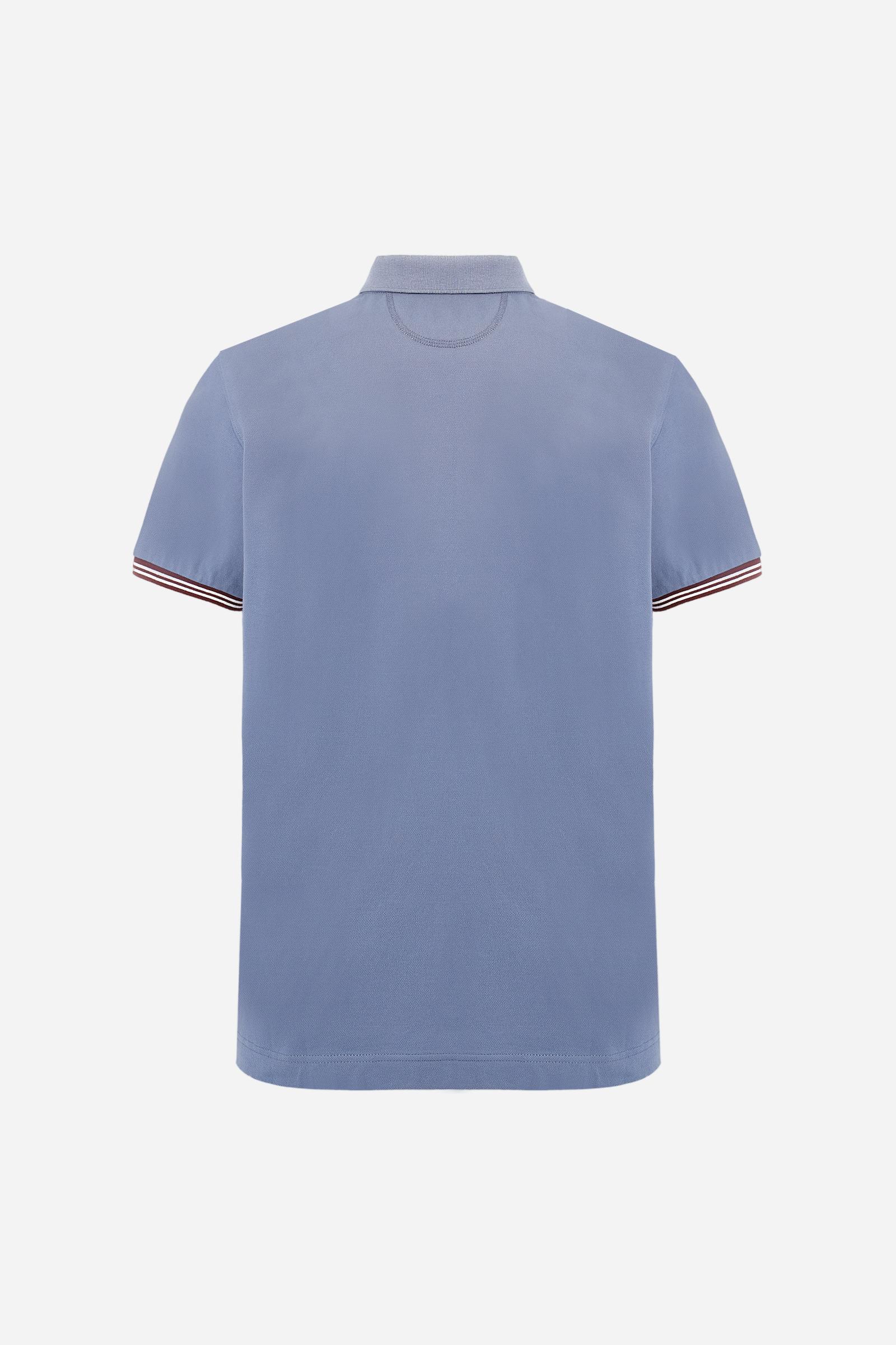 Men’s short-sleeve polo in high-quality stretch cotton piqué, ensuring excellent breathability and flexibility. Classic ribbed collar, two-button placket with customized buttons. Inner collar enriched with contrast tapes and colors for a modern touch. Multicolored ribbed cuffs with different patterns. Small contrast logo embroidered on the chest. Regular fit. Model wears size L. - Flint Stone