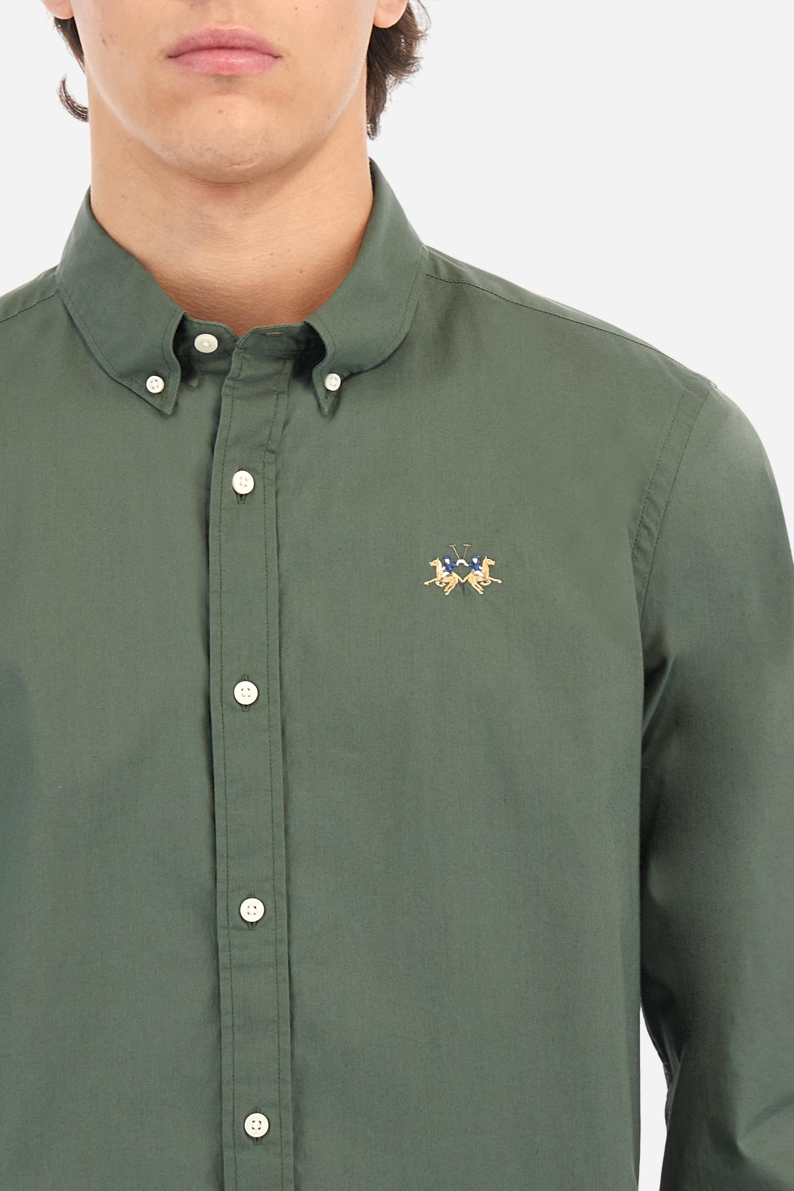 Men's plain long-sleeved shirt made from stretch cotton poplin for a comfortable fit. Featuring a button-down collar and woven labels at the bottom of the opening. A multicoloured logo is embroidered on the chest, over the heart, in contrasting thread. The slim fit ensures a sleek and modern look. The model is wearing a size L. - Thyme