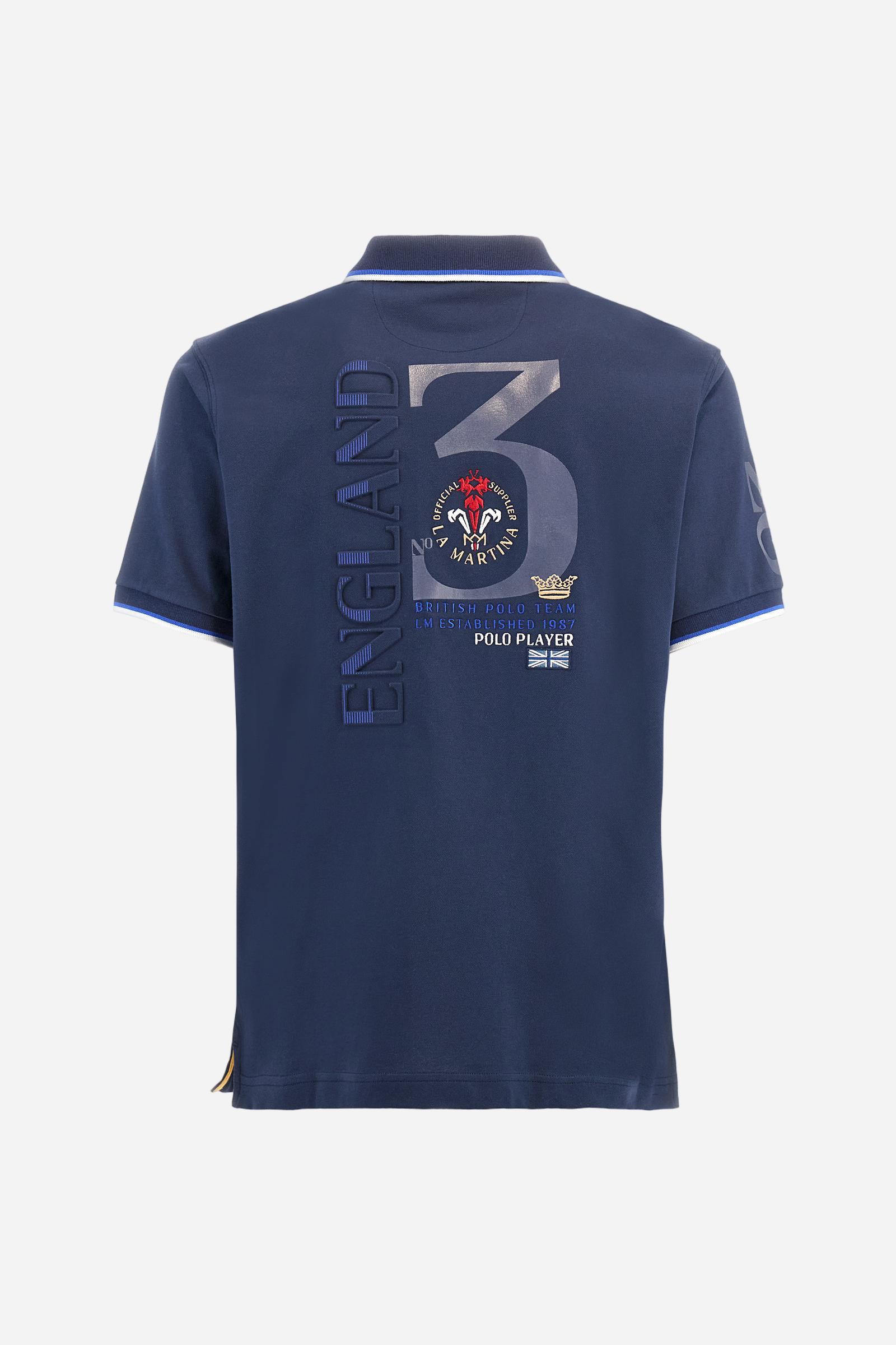 Men's solid color polo shirt, made of slightly elasticated cotton piqué. Two-button closure. Ribbed collar and sleeve hems, with a contrasting two-tone detail at the bottom of the sleeves. The entire garment features details crafted using mixed techniques. Both the front and back display embroidery and prints. The logo and the La Martina lettering are embroidered on the left chest. The fit is regular. The model is wearing size L. - Navy