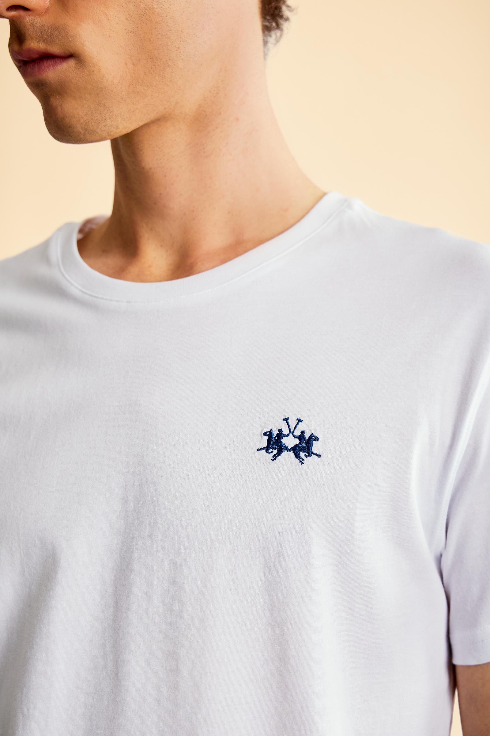 Men's short-sleeved crew-neck T-shirt in solid color with embroidered logo. Made of 100% cotton, perfect for a casual and trendy look with shorts or trousers. - Optic White