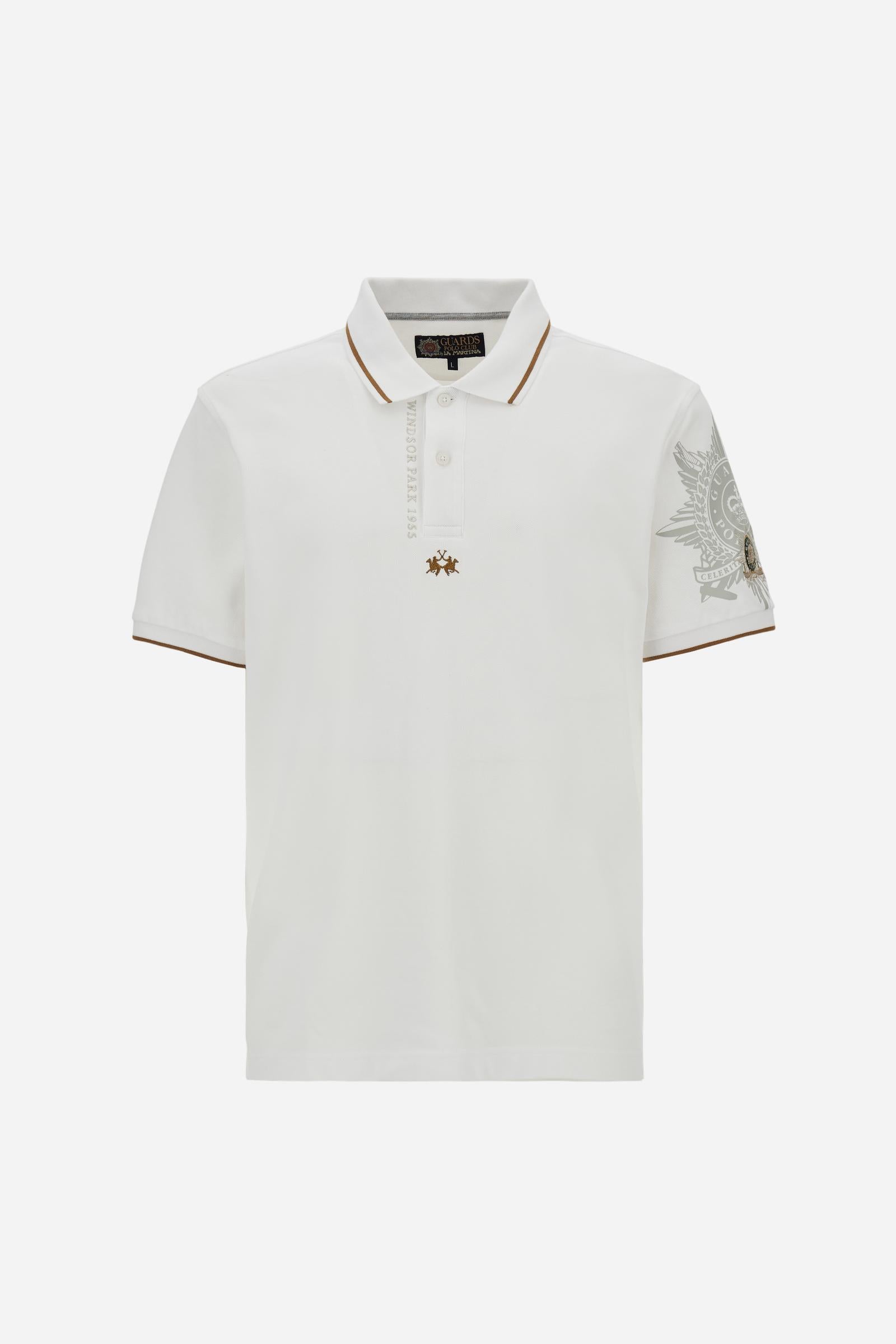Men’s short-sleeve polo shirt in 100% cotton piqué with contrasting details, ribbed collar, and a unique graphic on the sleeve celebrating the Guards capsule - Optic White