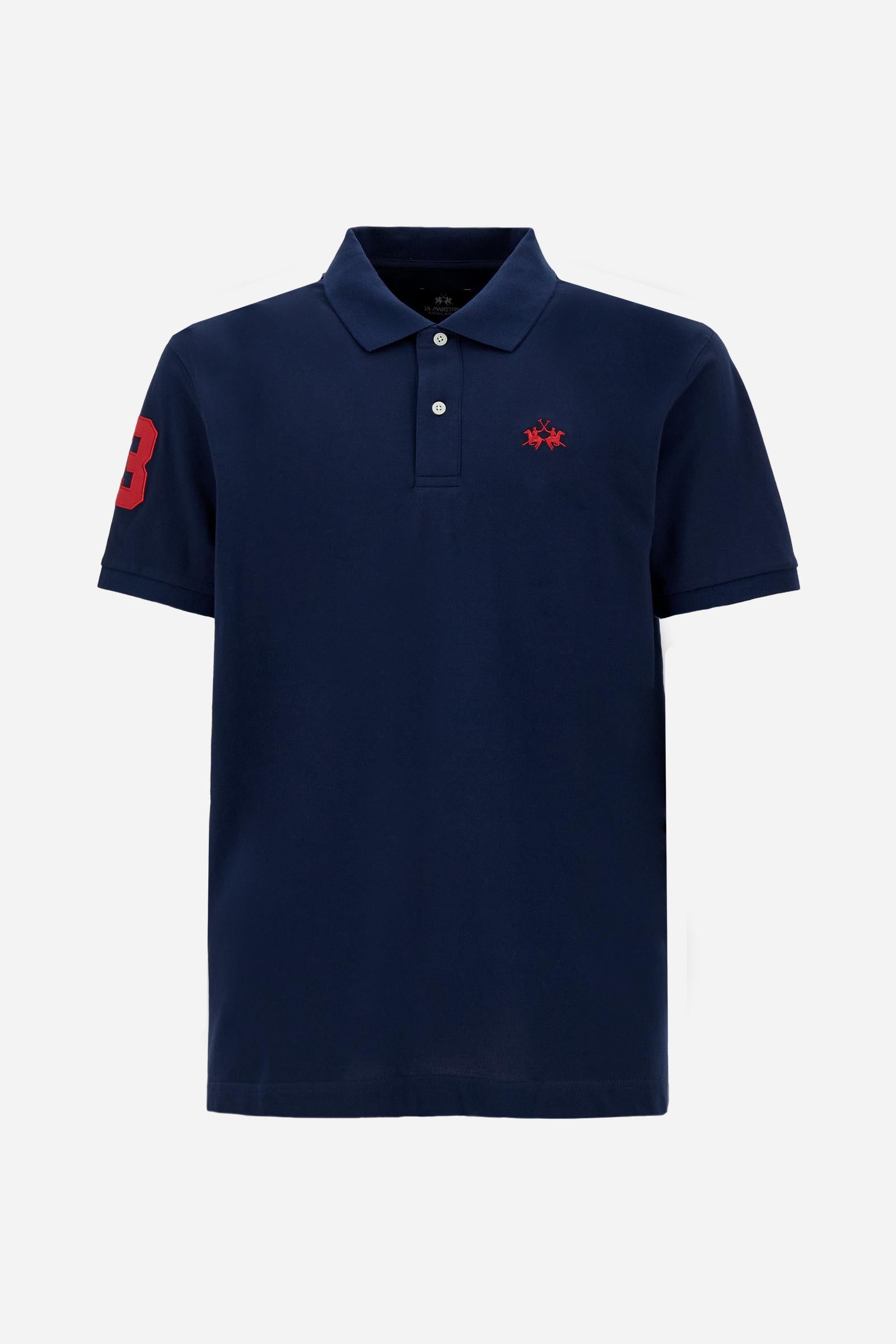 Men’s short-sleeve stretch piqué polo. Two-button placket and ribbed details, with a regular fit. Iconic style characterised by applied logo and patches. - Navy