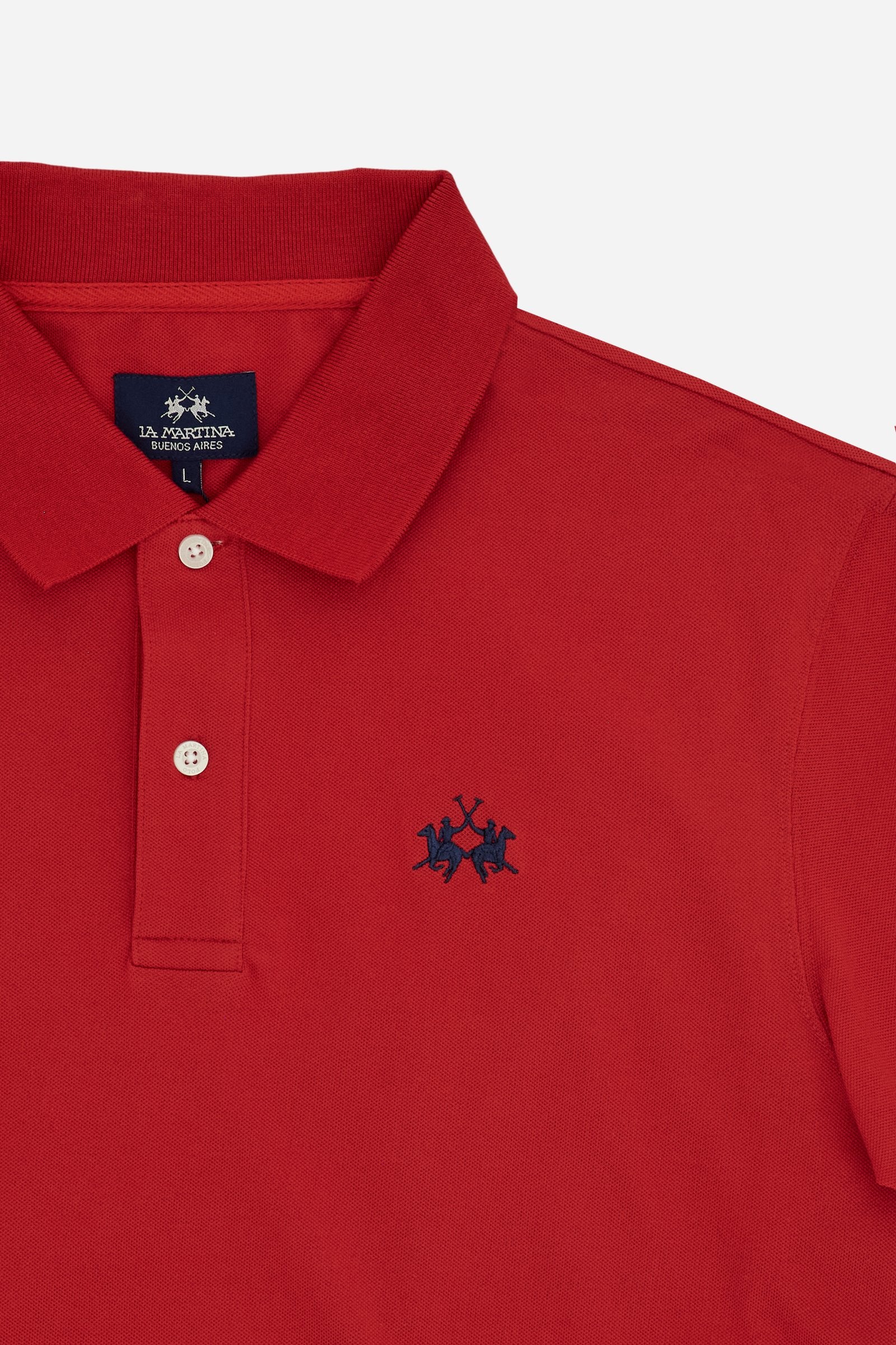 Men’s short-sleeve stretch piqué polo. Two-button placket and ribbed details, with a regular fit. Iconic style characterised by applied logo and patches. - Formula One