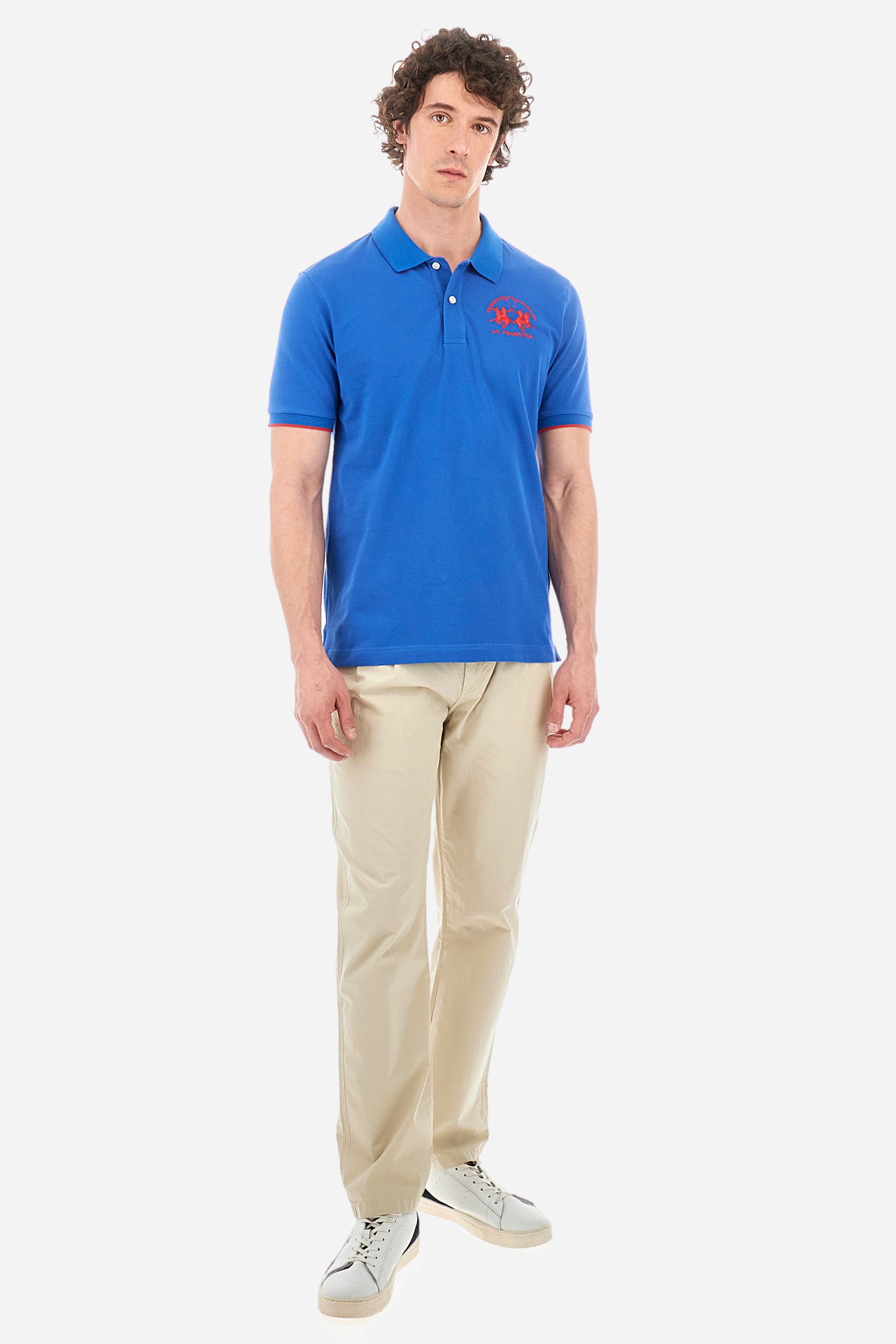 Men's short-sleeved, regular-fit polo shirt. A classic model with a contrasting La Martina logo-embellished chest and profiled sleeve trims. Perfect when worn with a pair of jeans from the collection. - Classic Blue