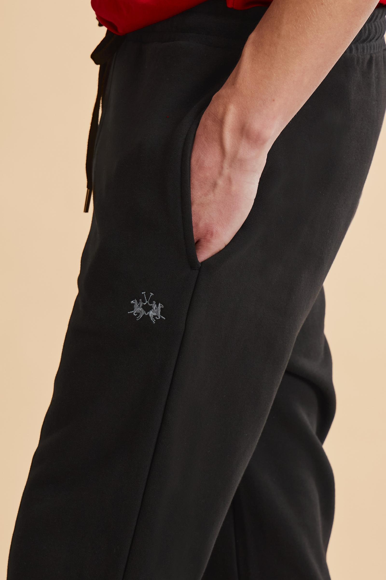 Men’s cotton fleece jogger pants with tapered cut and slim fit, ribbed cuffs and contrast embroidered logo. - Black