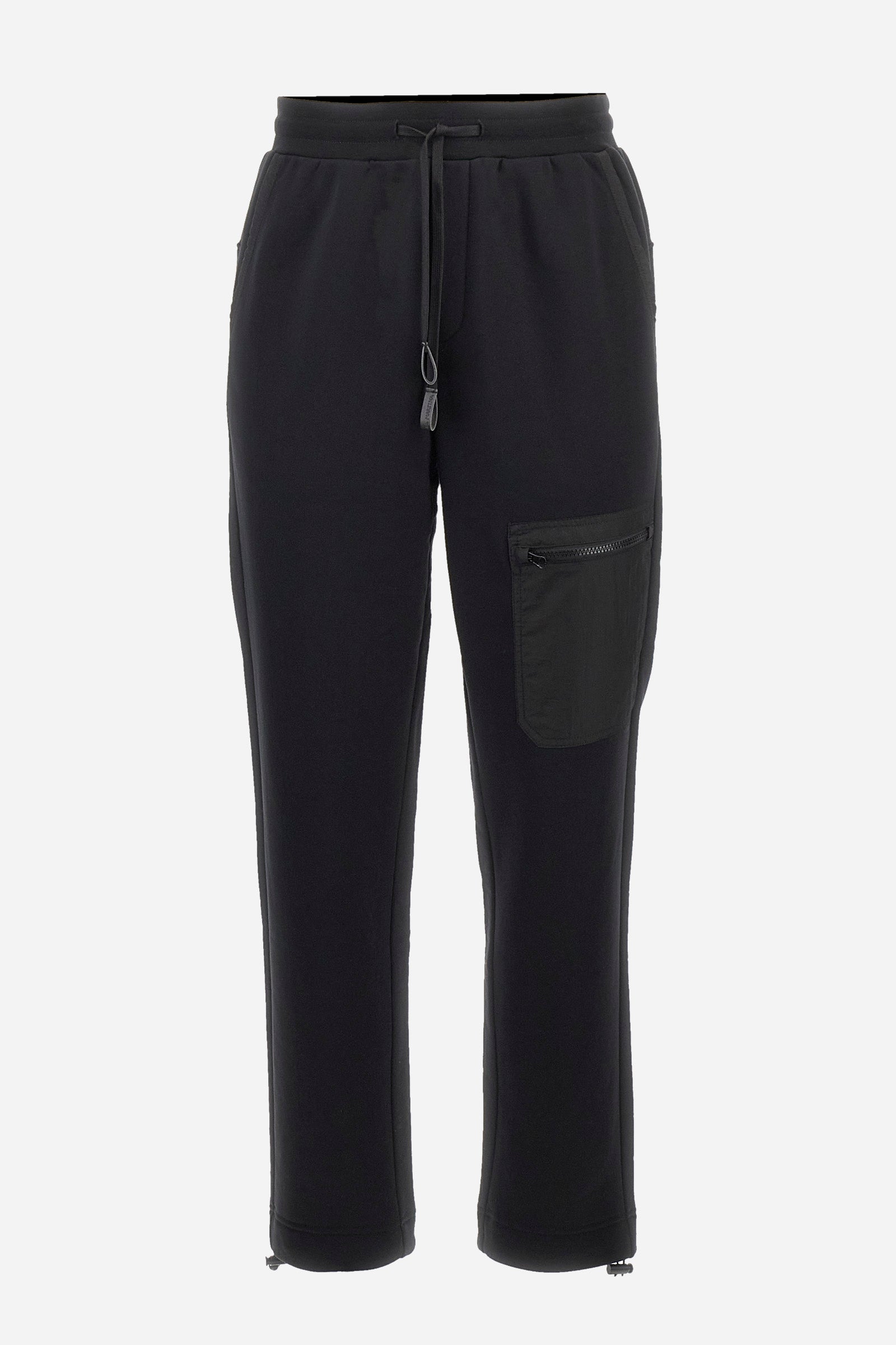 Men's plain jogging bottoms, made from a cotton blend. Drawstring waist and cuffs. Double front pocket. There is an additional zipped pocket on the front. The logo appears on an appliquéd plaque the back. Regular fit. The model is wearing a size L. - Black