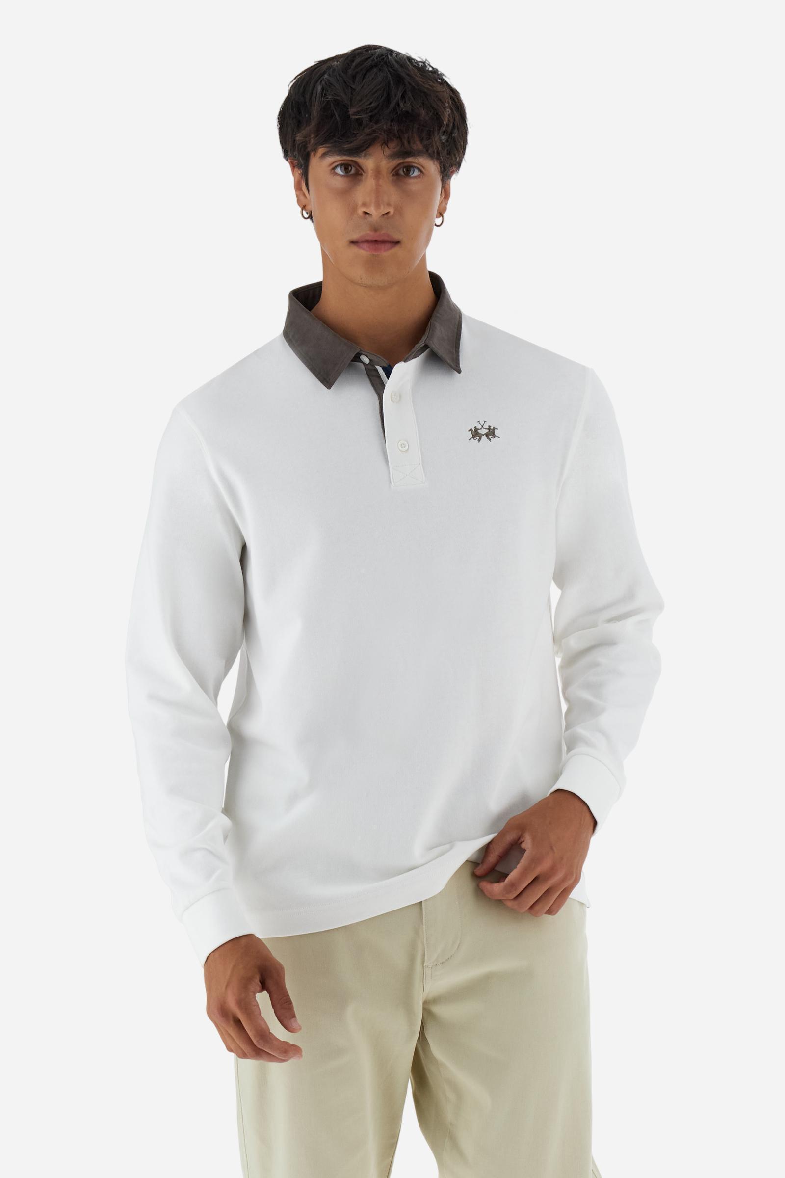 Classic men’s long-sleeve polo in soft-touch 100% cotton jersey. Contrast gabardine collar, three-button placket with multicolor striped tape. Iconic La Martina lettering printed in contrast under the collar. Small contrast logo embroidered on the chest. Regular fit for a balanced silhouette. Model wears size L. - Off White