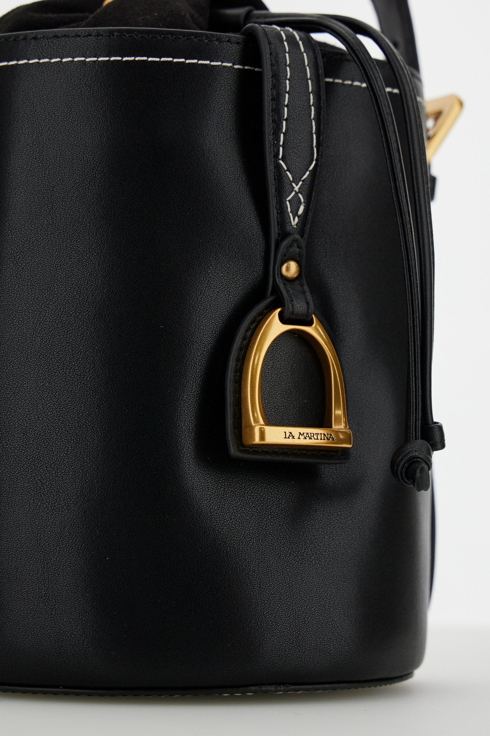 Structured bucket bag in soft calfskin with gold maxi logo buckle on the front, featuring a clean and refined design. - Black