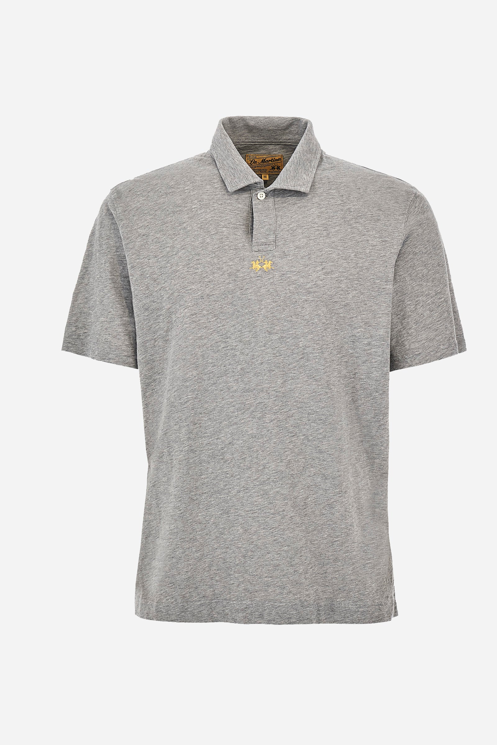 This is the iconic Polo 19-42 from La Martina. Men's short-sleeved polo shirt in solid color made of 100% slub jersey. With a regular fit, it has a collar and a double button closure while the La Martina logo is embroidered in small gold on the front under the placket. Ideal when worn with denim from the collection. Each Polo is kept in an exclusive logoed envelope and is accompanied by a certificate of guarantee. The model is 187 cm tall and wears a size L. - Light Heather Grey