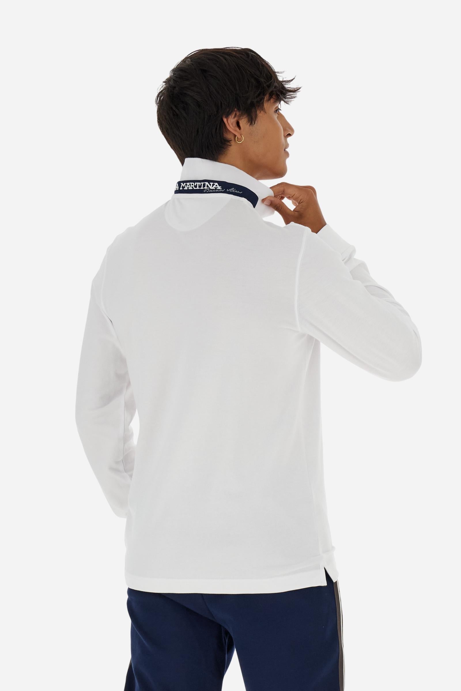 Men’s long-sleeve polo in high-quality stretch cotton piqué for comfort and flexibility. Tone-on-tone ribbed collar with contrast gabardine undercollar embroidered with the brand’s iconic lettering, revealed when the collar is lifted. Contrast embroidered logo on the chest. Slim fit, offering a modern silhouette that enhances the body while ensuring freedom of movement. Model wears size L. - Optic White