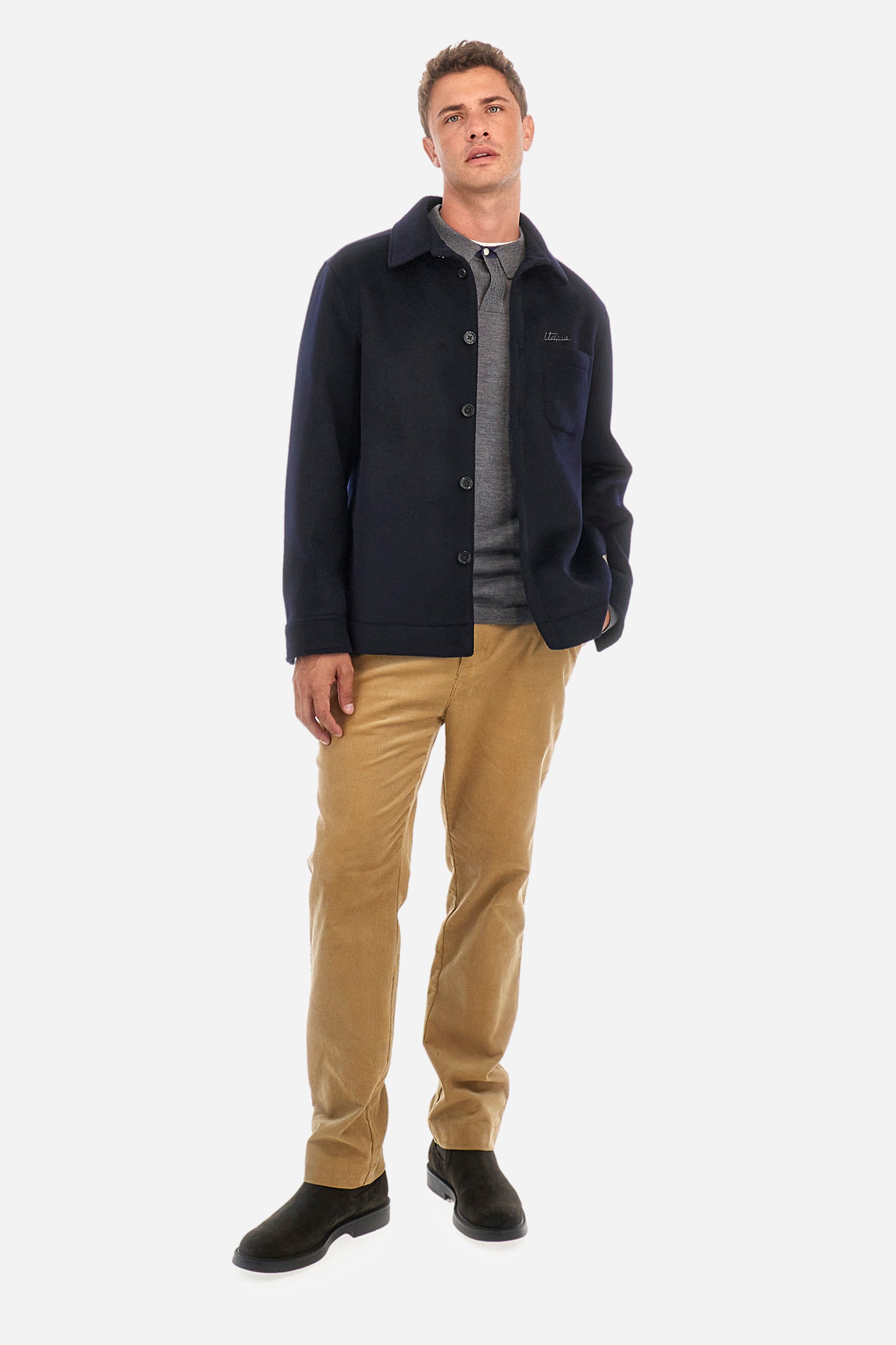 Men's single-colour Pagani jacket with suede effect and long sleeves. Made of wool and cashmere. Pointed collar and button fastening. There is an open pocket on the chest. La Martina lettering can be found on the patch on the back. Regular fit. The model is wearing a size L. - Navy