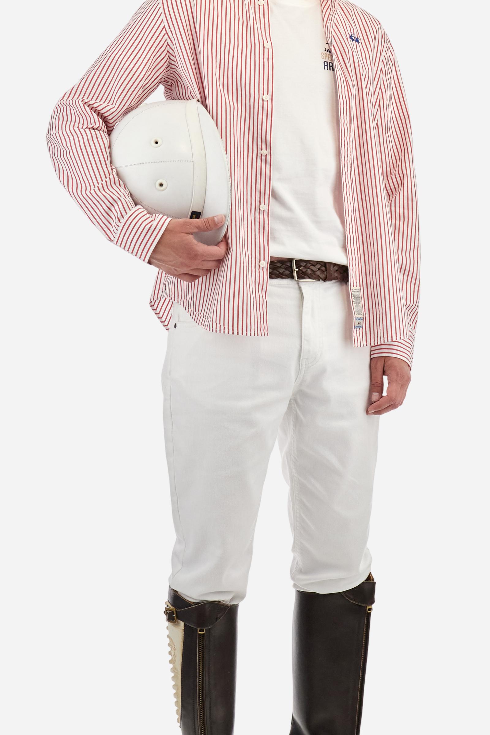 Men's two-tone striped long-sleeved shirt made from cotton poplin. Featuring a button-down collar and woven labels at the bottom of the opening. The logo is embroidered on the chest, over the heart, in contrasting thread. Regular fit. The model is wearing a size L. - Optic White/Poppy re