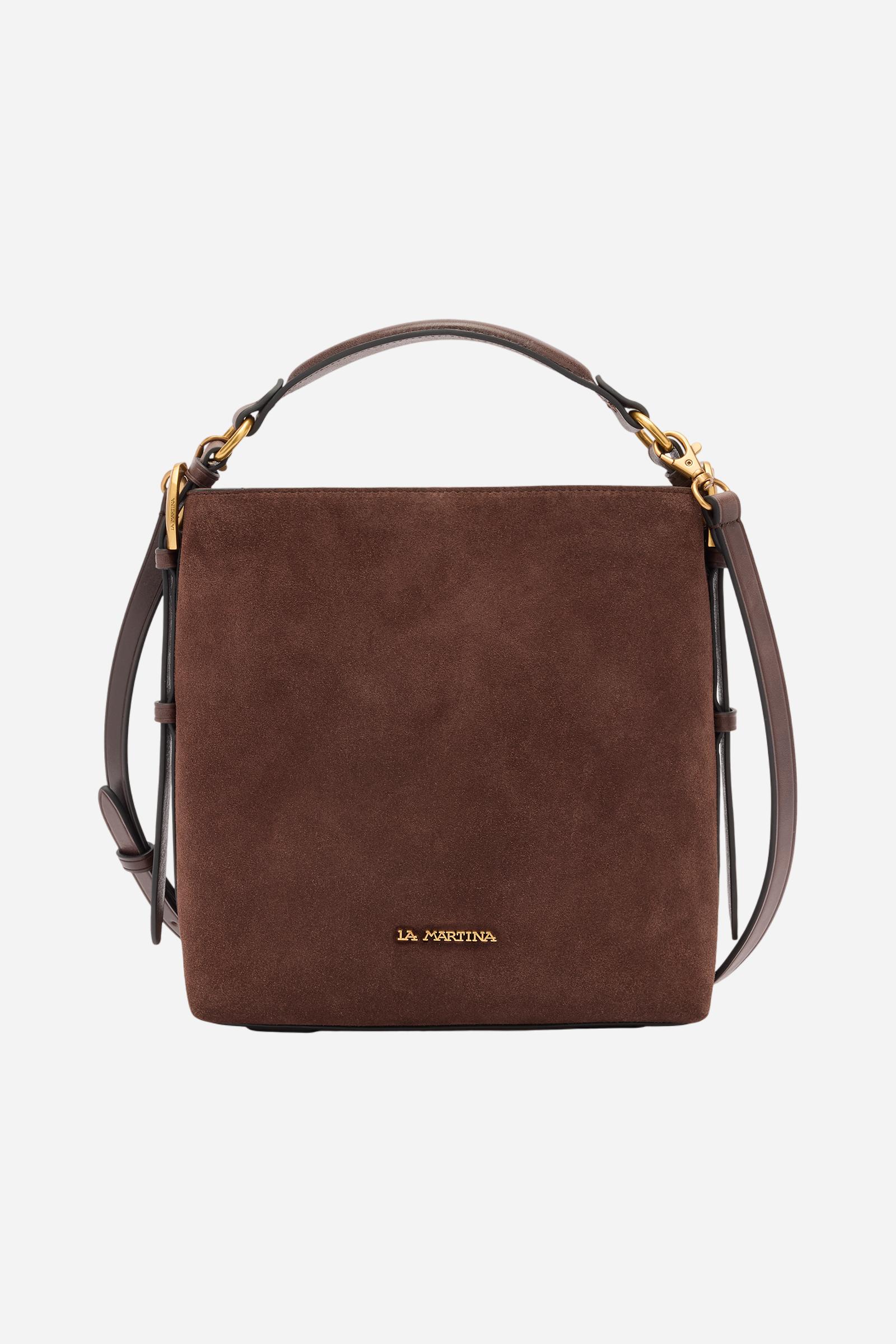 Compact square-shaped tote bag crafted from soft solid-colour suede. Featuring a structured top handle and a detachable leather shoulder strap. Gold-tone metal details and a front logo plaque complete the elegant, understated design. Dimensions:22 x 23 x 11 - D.BROWN/D.CHOCOLATE