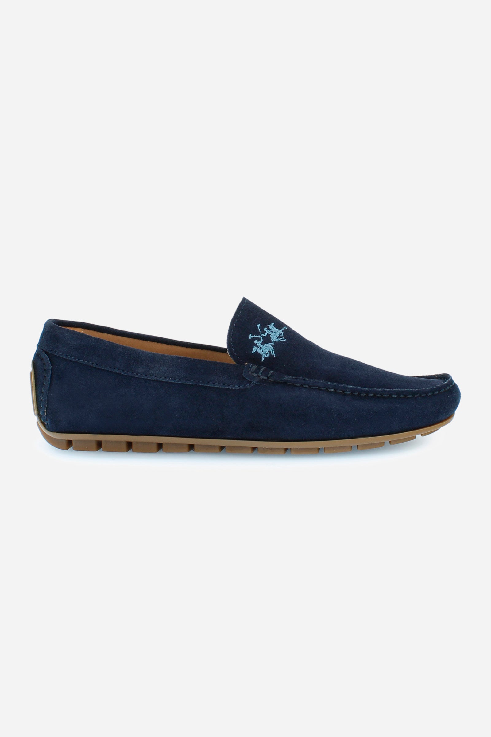 Men's loafers in soft suede for the summer season. Made using the tubular technique to give the model softness and flexibility. The full-colour suede is delicately punctuated by the embroidery of the logo in a contrasting colour on the faceplate and the hand-stitched ends of the faceplate. For both leisure and informal occasions, helping to create a sporty yet refined look. - BLUE