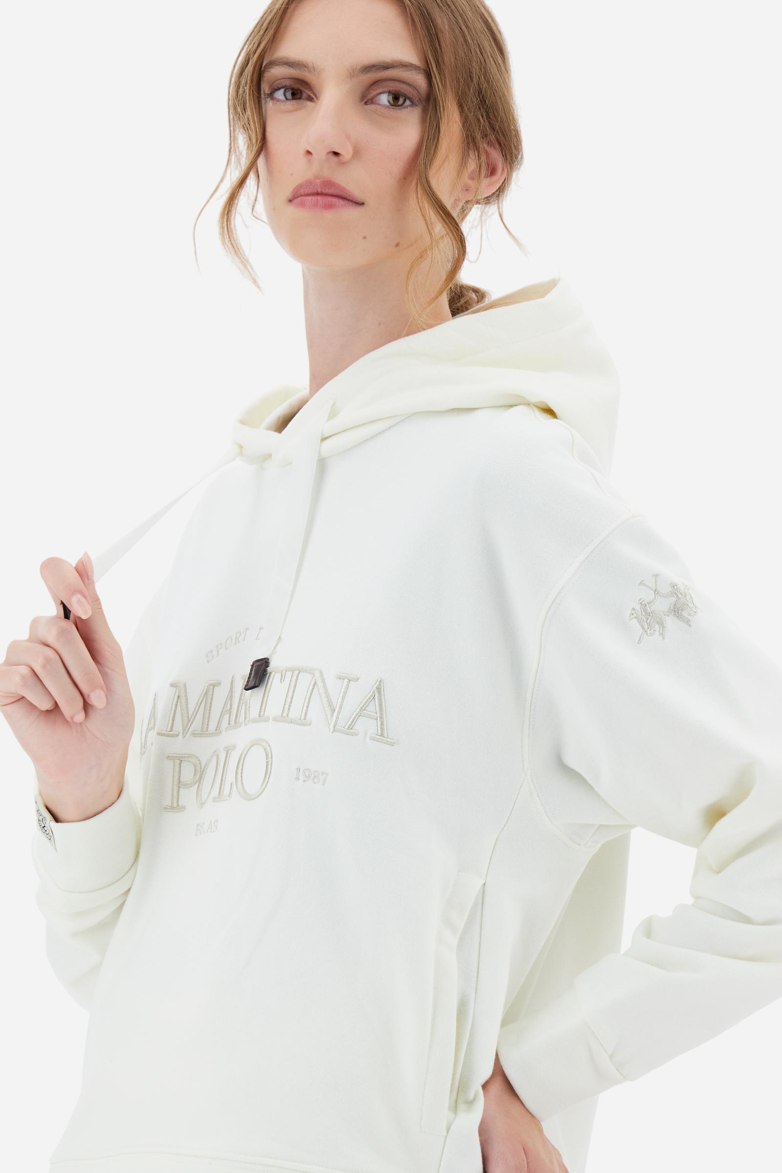 Women’s hoodie with long sleeves in 100% cotton french terry, solid colour with a velvety and warm touch. The hood is lined in tone-on-tone jersey and finished with a velvet drawstring. The chest graphic recalls the refined aesthetics of the Royal Polo theme, while the small brand logo is tone-on-tone embroidered on the sleeve. The model wears size L. - Off White