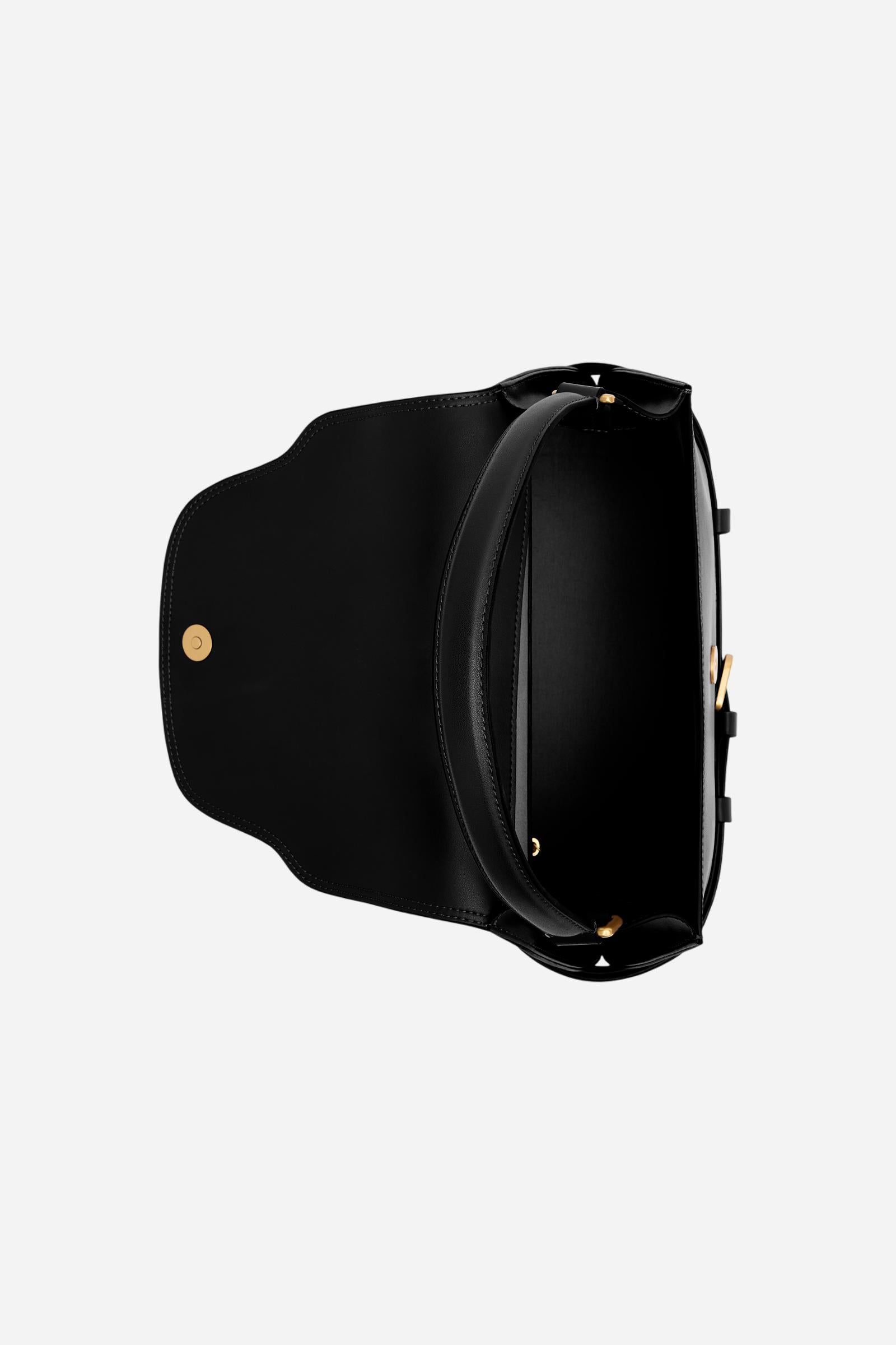 Calfskin leather tote bag with trapeze shape and flap closure. Elegant and modern design with rigid handle and removable strap. - Black