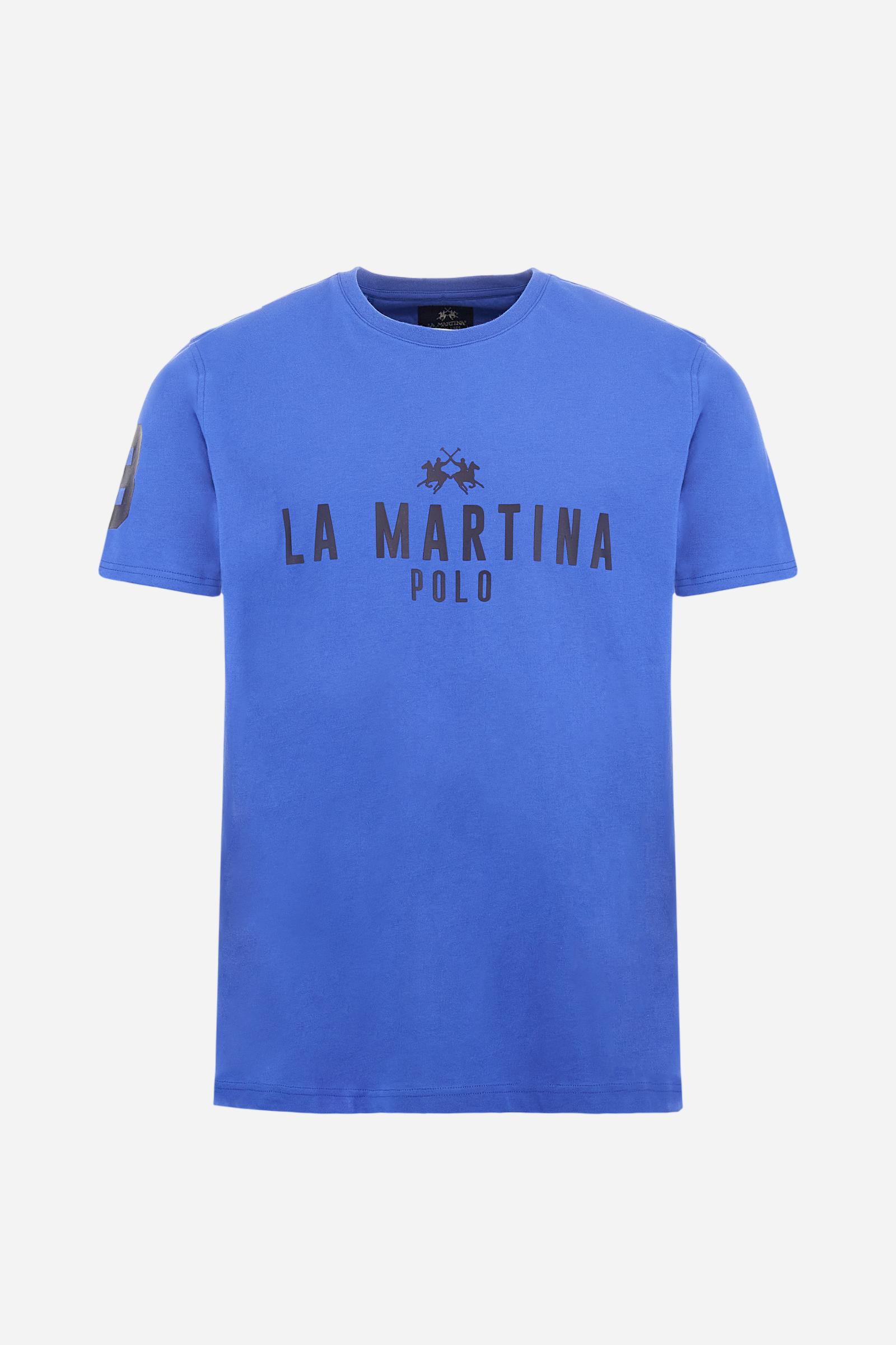 Men's single-colour crew-neck T-shirt with short sleeves, made of 100% cotton. The front features a printed logo and the lettering La Martina Polo. The number 3 is printed on one of the sleeves. Regular fit. The model is wearing a size L. - Dazzling Blue