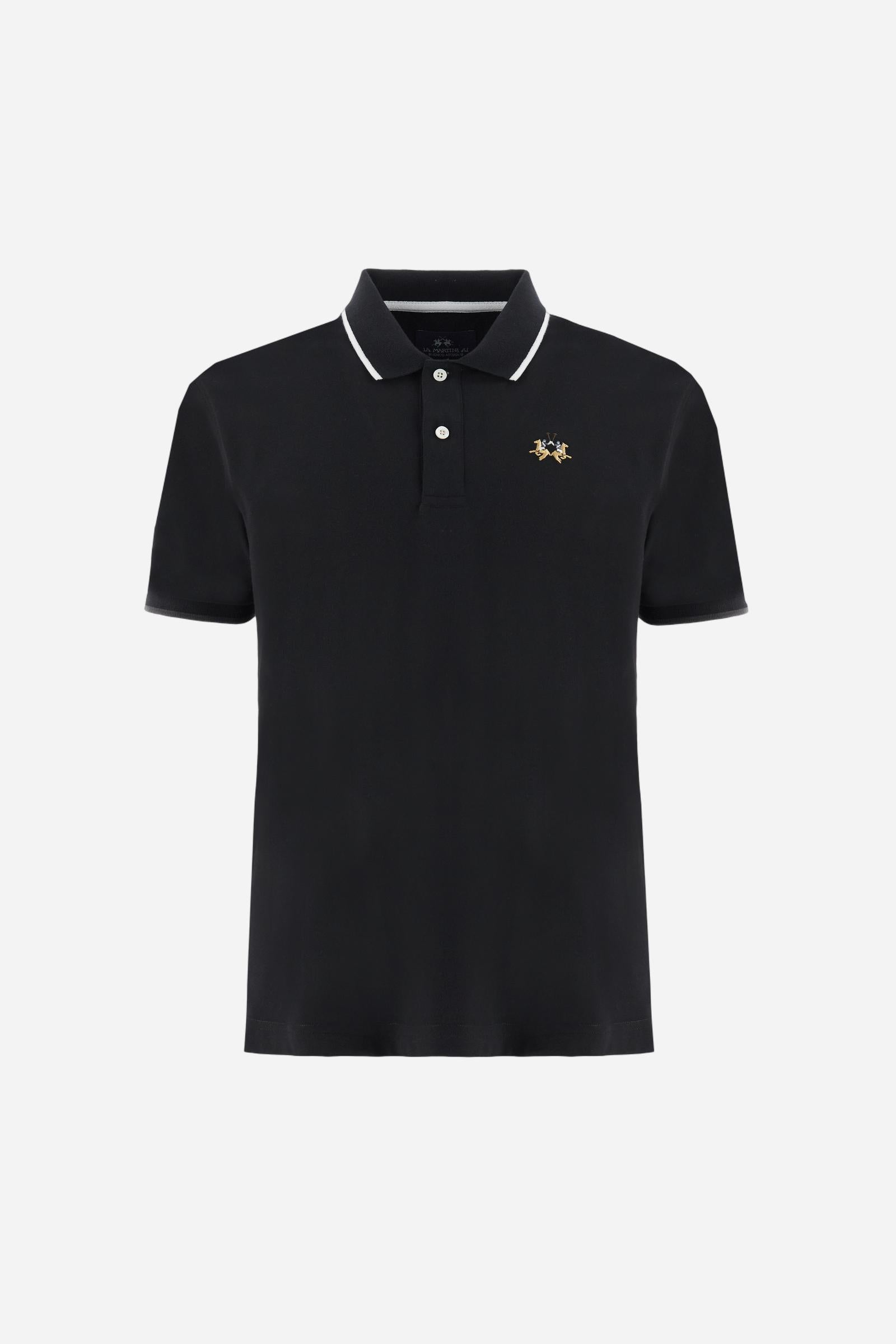 Short-sleeved, single-colour men's polo shirt made of stretch cotton piqué. Fastens with two buttons. The collar and cuffs are ribbed, and there is a colour-contrasting trim at the bottom of the collar. Inside the collar there is a grosgrain ribbon of a different shade. The logo is embroidered on the chest in a contrasting colour. The fit is slim. The model is wearing a size L. - Black