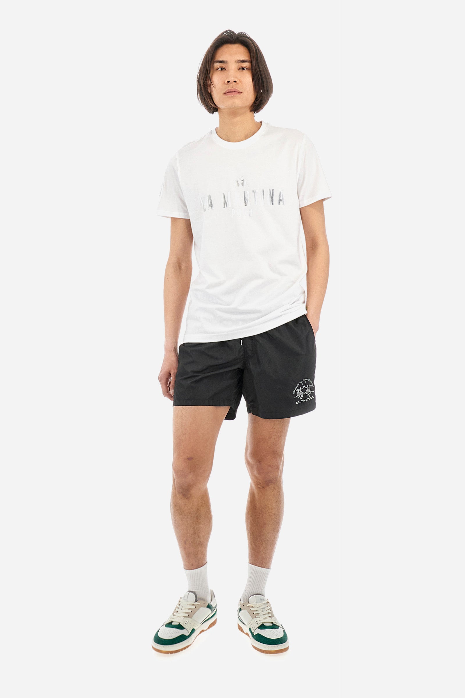 Men's short-sleeved T-shirt with a crew neck in a single colour. Made of 100% cotton. The front features a printed logo and the lettering "La Martina Polo". The number 3 is printed on one of the sleeves. Regular fit. The model wears a size L. - Optic White