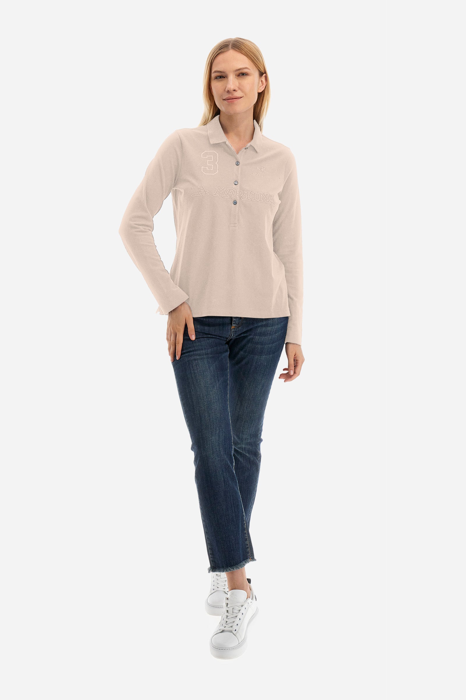 This women's polo shirt from the Timeless line is made of stretch cotton and has a regular fit. Available in a wide range of colours, it is perfect for those looking for a simple but quality garment. The solid colour and the embossed print of the La Martina logo on the front, together with the number 3, make it an elegant and unique garment. The classic 4-button collar completes the ideal look for a casual or sporty outfit. The model is 174 cm tall and wears a size 2. - Tillandsia Purple