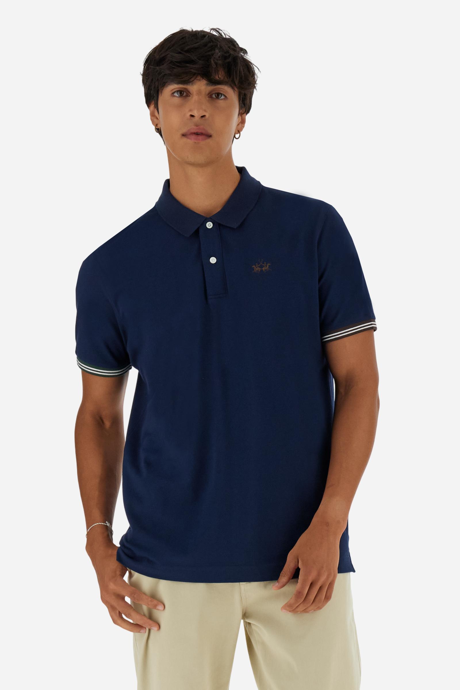 Men’s short-sleeve polo in high-quality stretch cotton piqué, ensuring excellent breathability and flexibility. Classic ribbed collar, two-button placket with customized buttons. Inner collar enriched with contrast tapes and colors for a modern touch. Multicolored ribbed cuffs with different patterns. Small contrast logo embroidered on the chest. Regular fit. Model wears size L. - Navy