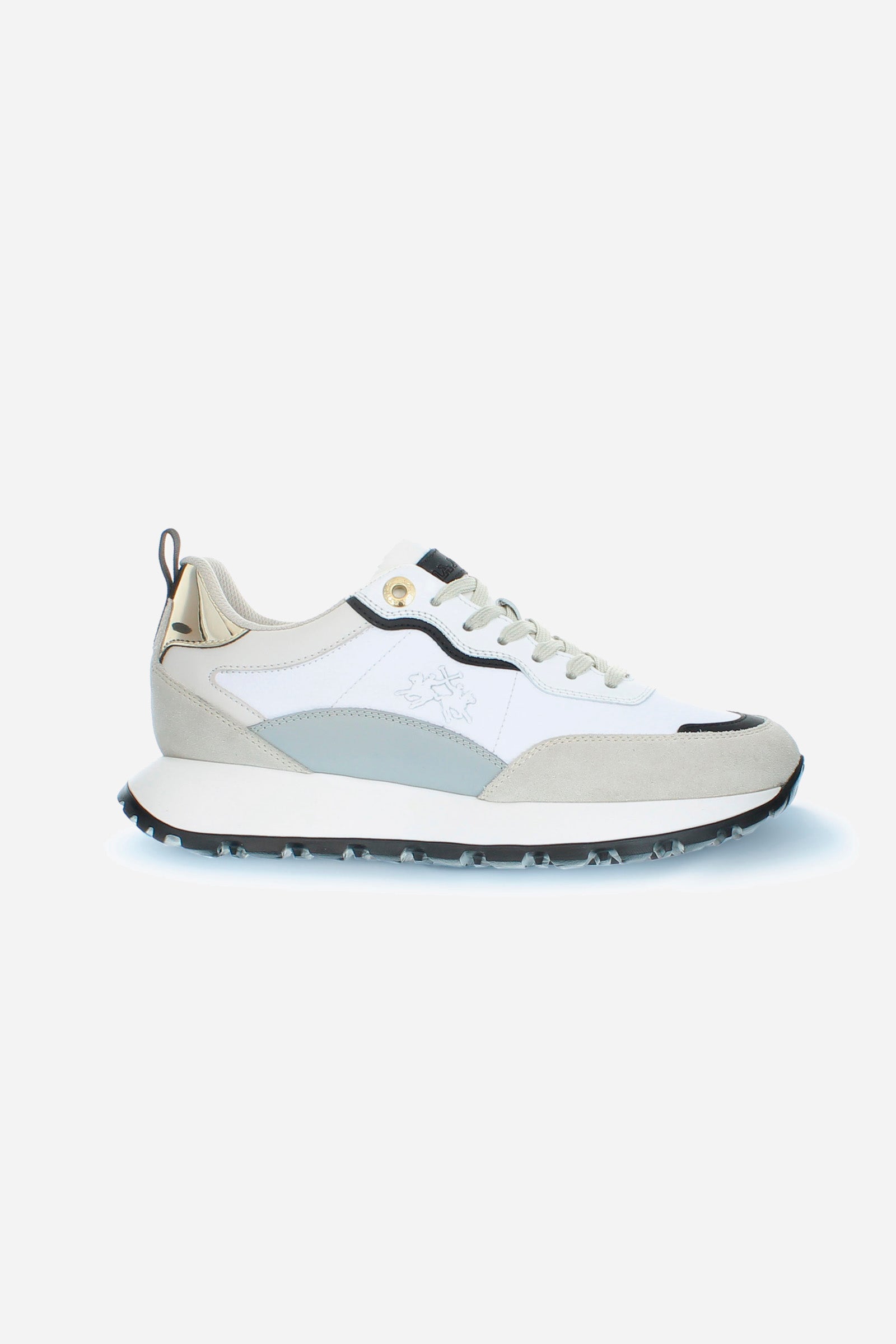 Women's trainer in soft leather with details in suede