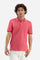 Short-sleeved, single-colour men's polo shirt made of stretch cotton piqué. Fastens with two buttons.  The collar and cuffs are ribbed, and there is a colour-contrasting trim at the bottom of the collar.  Inside the collar there is a grosgrain ribbon of a different shade. The logo is embroidered on the chest in a contrasting colour. The fit is slim. The model is wearing a size L. - Honey Suckle