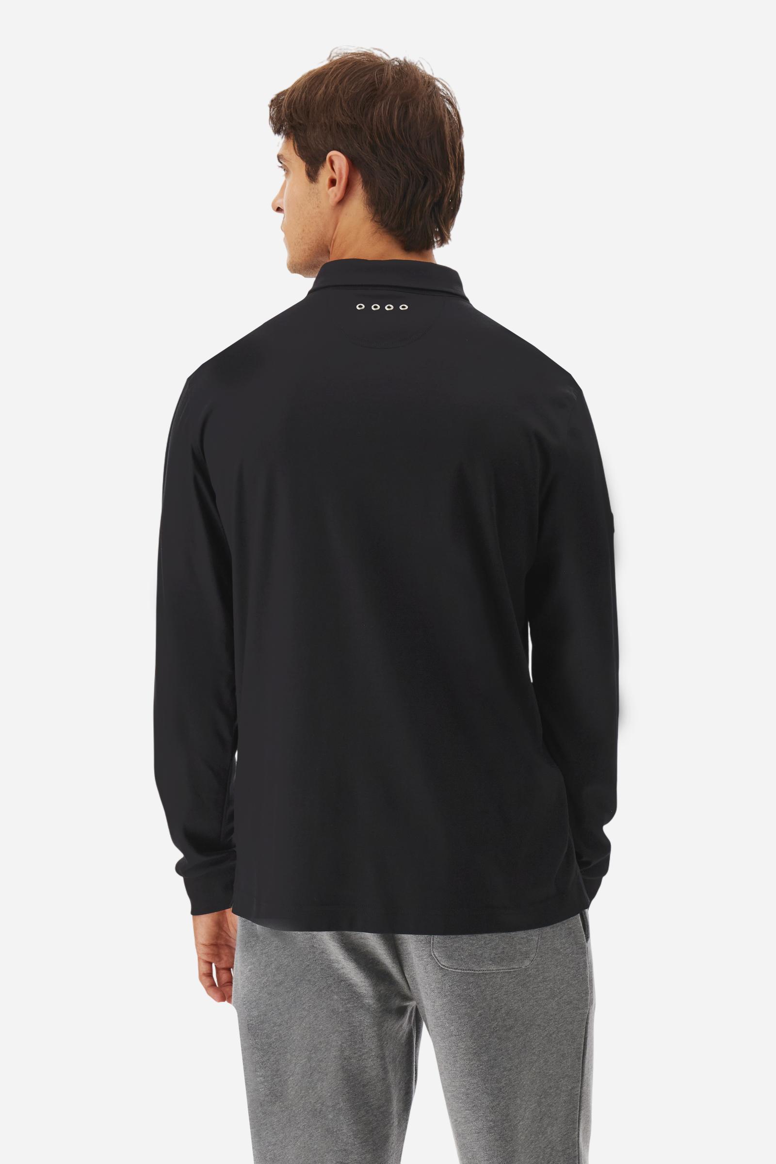 Premium men’s long-sleeve polo shirt in 100% cotton jersey with a smooth, silky texture. Hidden button placket and vertical contrast print. Patches dedicated to the Asociación Argentina de Polo (AAP) on the sleeve and below the opening. Small semi-transparent contrasting logo printed on the chest. Regular fit. The model wears size L. - Black