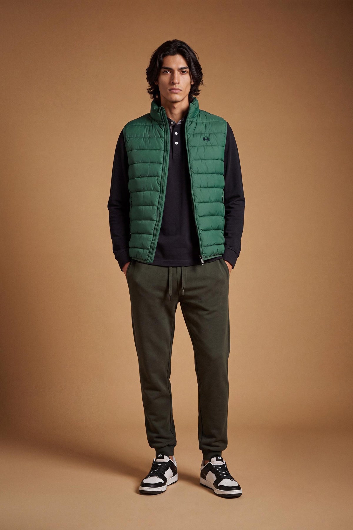 Men's sleeveless down jacket in lightweight nylon with wadding padding for warmth, zippered pockets, high collar, and contrasting interior and logo details. - Pine Grove