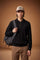 Men's long-sleeve sweater in 100% fine wool with a regular fit, knitted polo collar, half-zip front, natural shoulders, and tone-on-tone embroidered logo. - Black