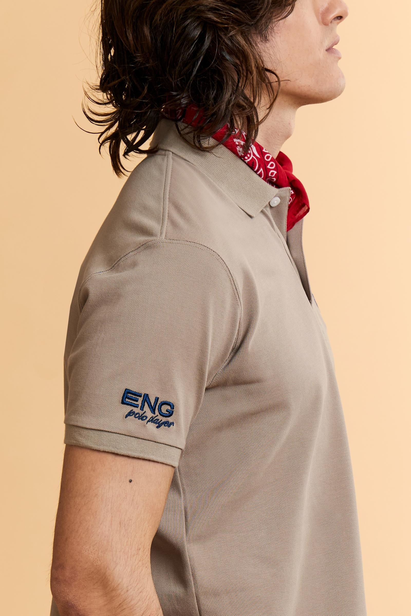 Men’s short-sleeve polo in solid 100% cotton piqué. Regular fit with matching ribbed details. Part of the “Nations” collection celebrating countries of the World Polo Tour through embroidered and printed graphics. Small contrast logo on the chest. The model wears size L. - Humus                                                                                                                                                                                                                                         